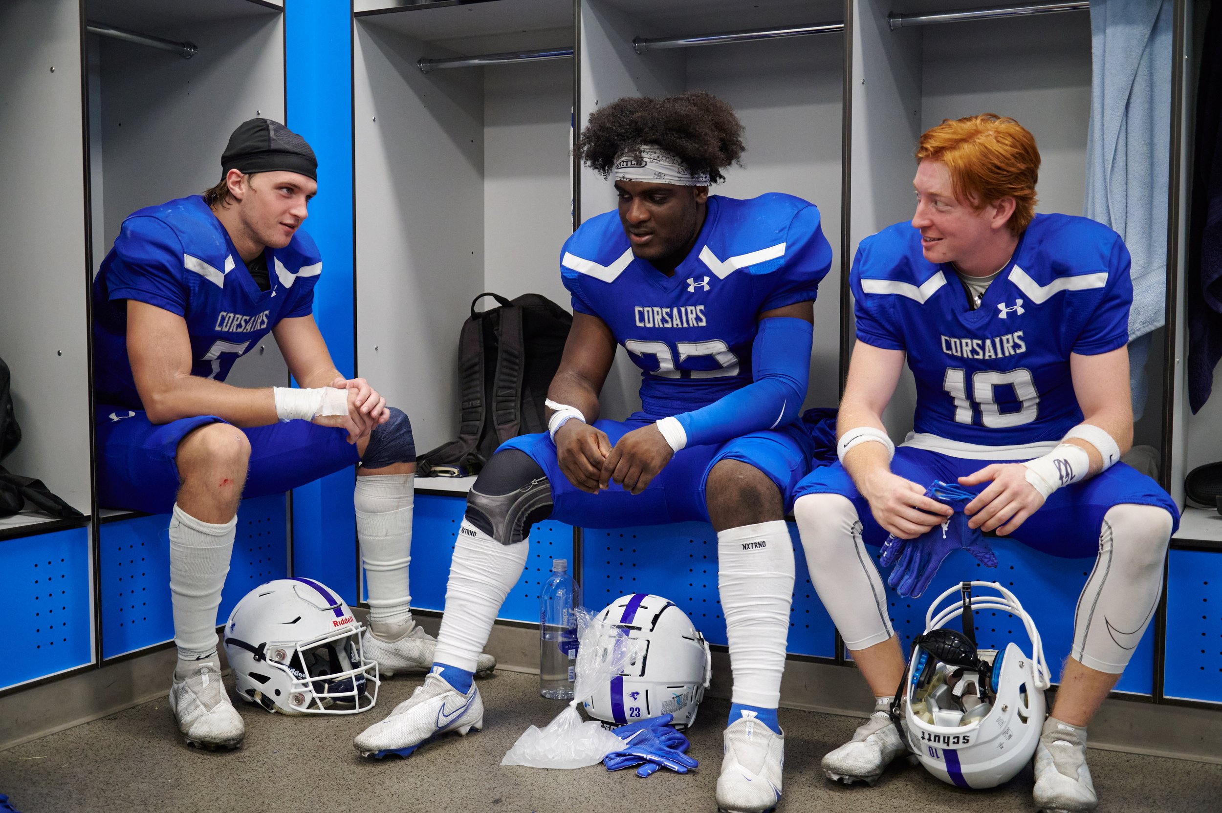  Santa Monica College Corsairs' Forrest Brock, Zaire Burks, and Levi Photenhauer in the locker room at halftime during the football match against the West Los Angeles College Wildcats on Saturday, October 1, 2022, at Corsair Field in Santa Monica, Ca