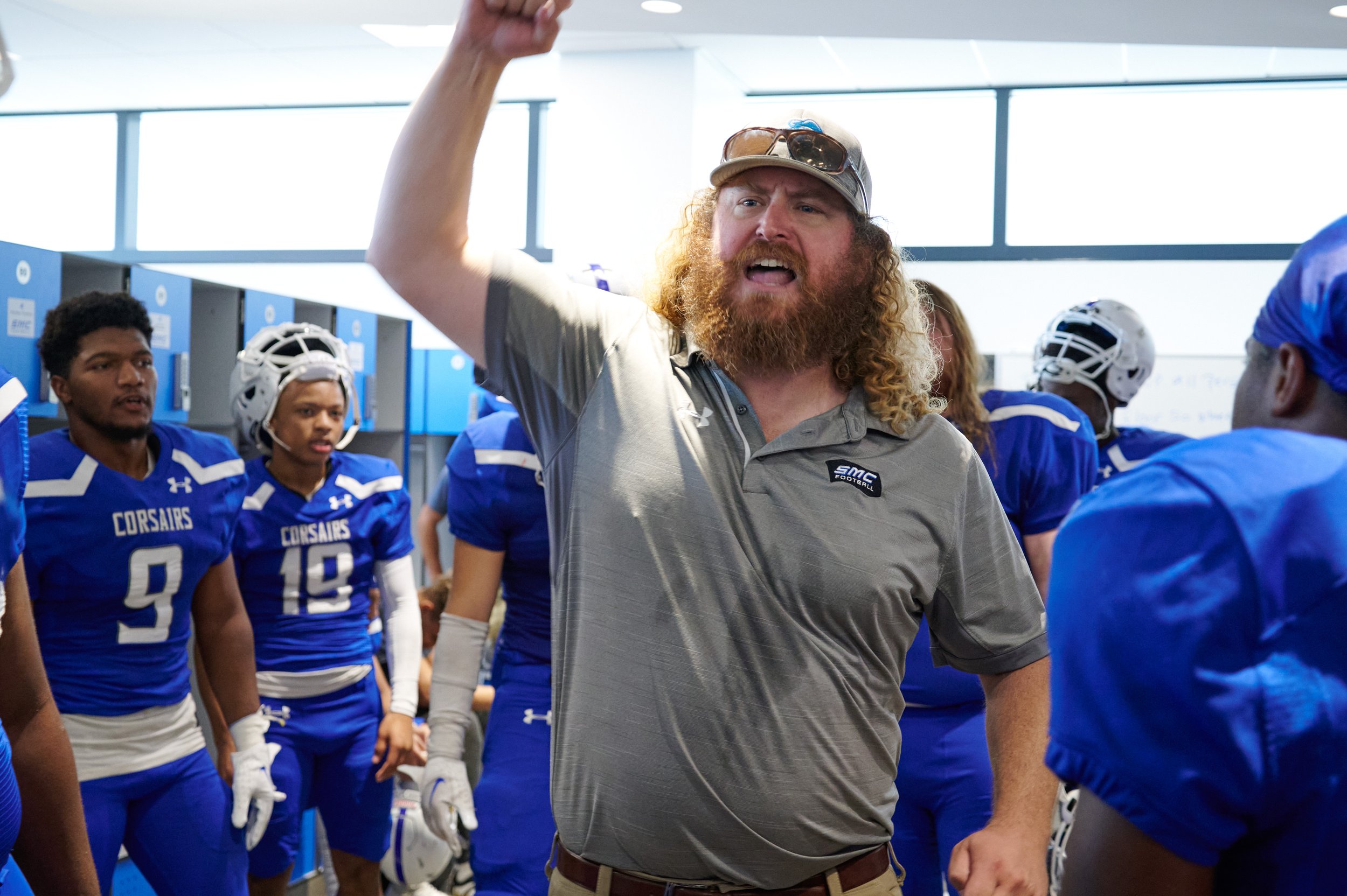  Santa Monica College Head Football Coach Kelly Ledwith revs up the team in the locker room upon heading out to begin the third quarter during the football match against the West Los Angeles College Wildcats on Saturday, October 1, 2022, at Corsair F
