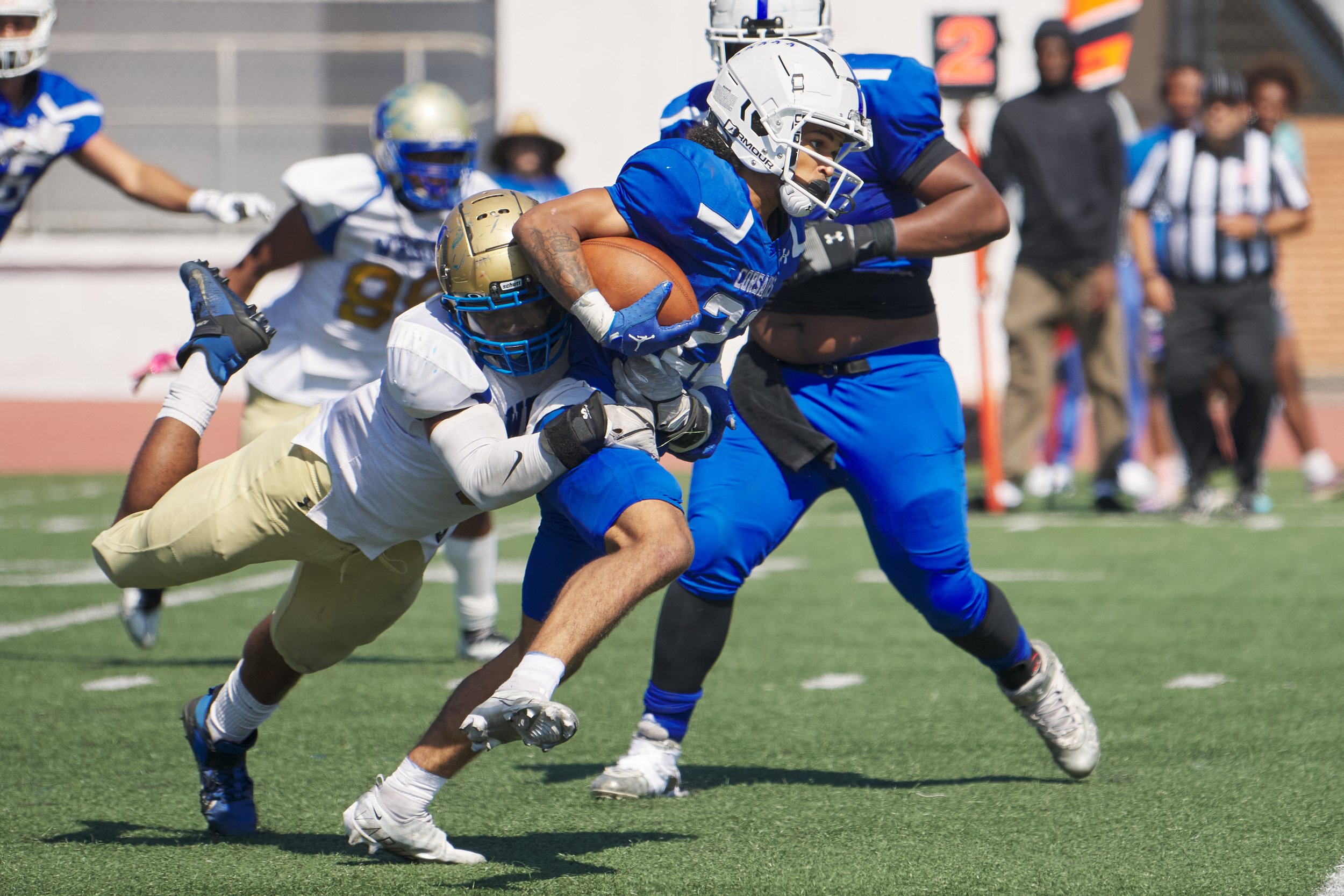  West Los Angeles College Wildcats' Franklin Randall latches on to Santa Monica College Corsairs' Jaden Bridges during the football match on Saturday, October 1, 2022, at Corsair Field in Santa Monica, Calif. The Corsairs won 41-40. (Nicholas McCall 