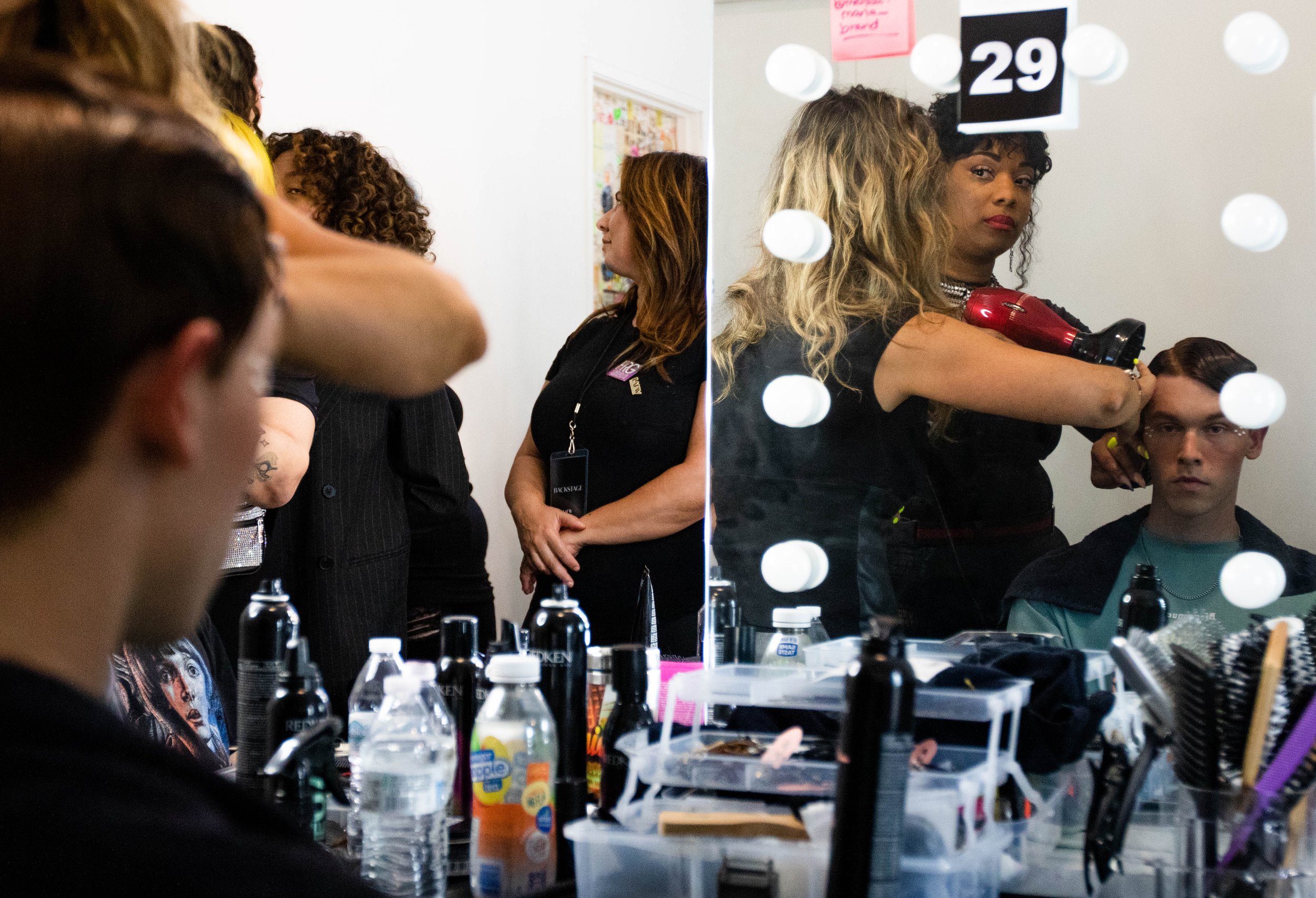  Hairstylist Melissa Robinson gives model Jack Sajwaj a soft wave for his look for designer Francis Libiran before he walks for Los Angeles Fashion Week. Oct. 7, 2022. Los Angeles, CA. (Ee Lin Tsen | The Corsair) 