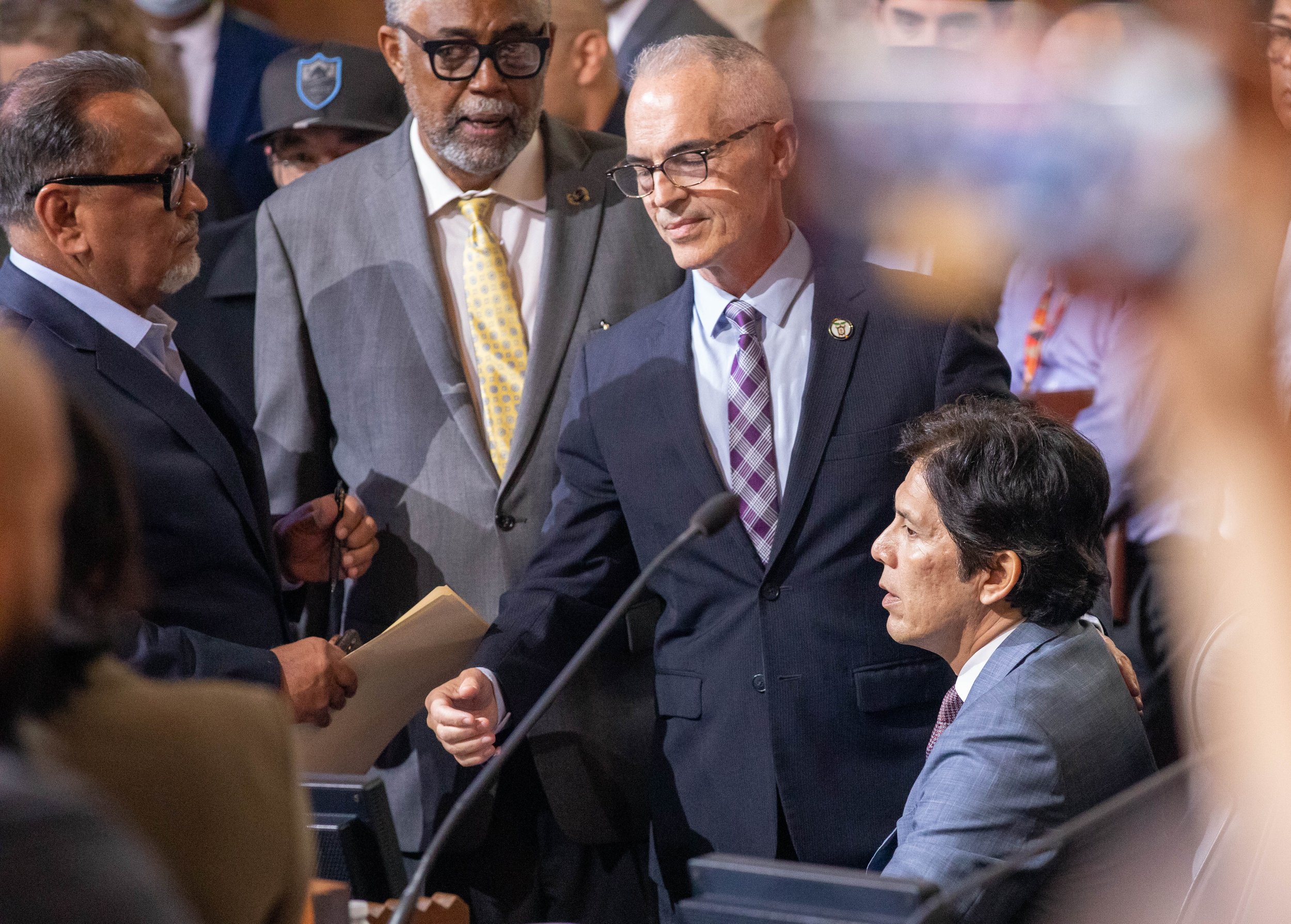  Los Angeles City coucnil memebrs Gil Cedillo(L) and Kevin De Leon(R) being advised to leave the meeting by acting president Mitch O'Farrell(C) in order to maintain control in the meeting on Tuesday, Oct. 11, 2022 at Los Angeles, Calif. (Danilo Perez