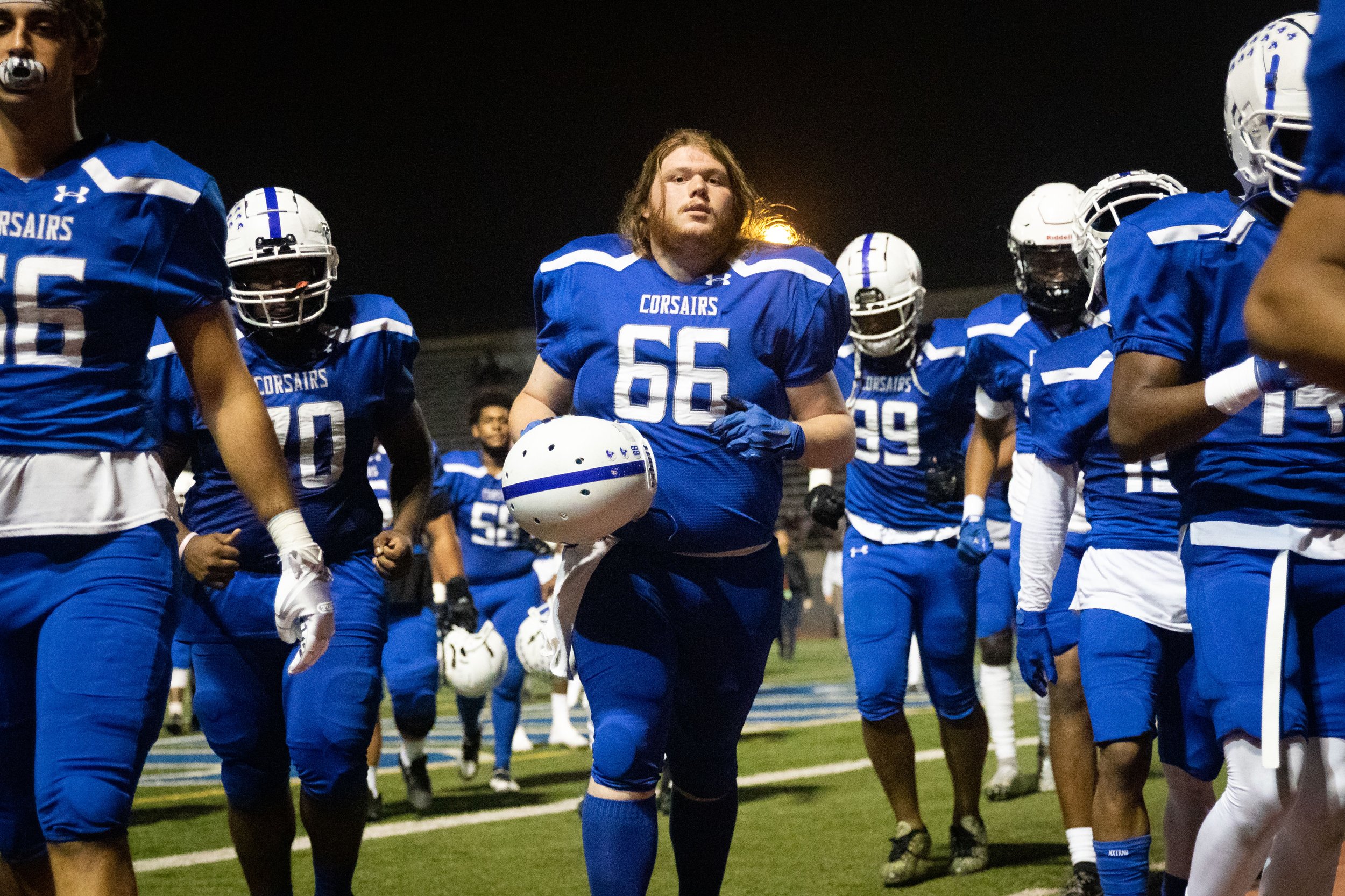  Santa Monica College Corsair offensive lineman Nick Mazzaro (66), along with the rest of his team, walking to the locker room during halftime in a recent home game against Moorpark College Raiders on Thursday, Oct. 13, 2022. The game went in favor o