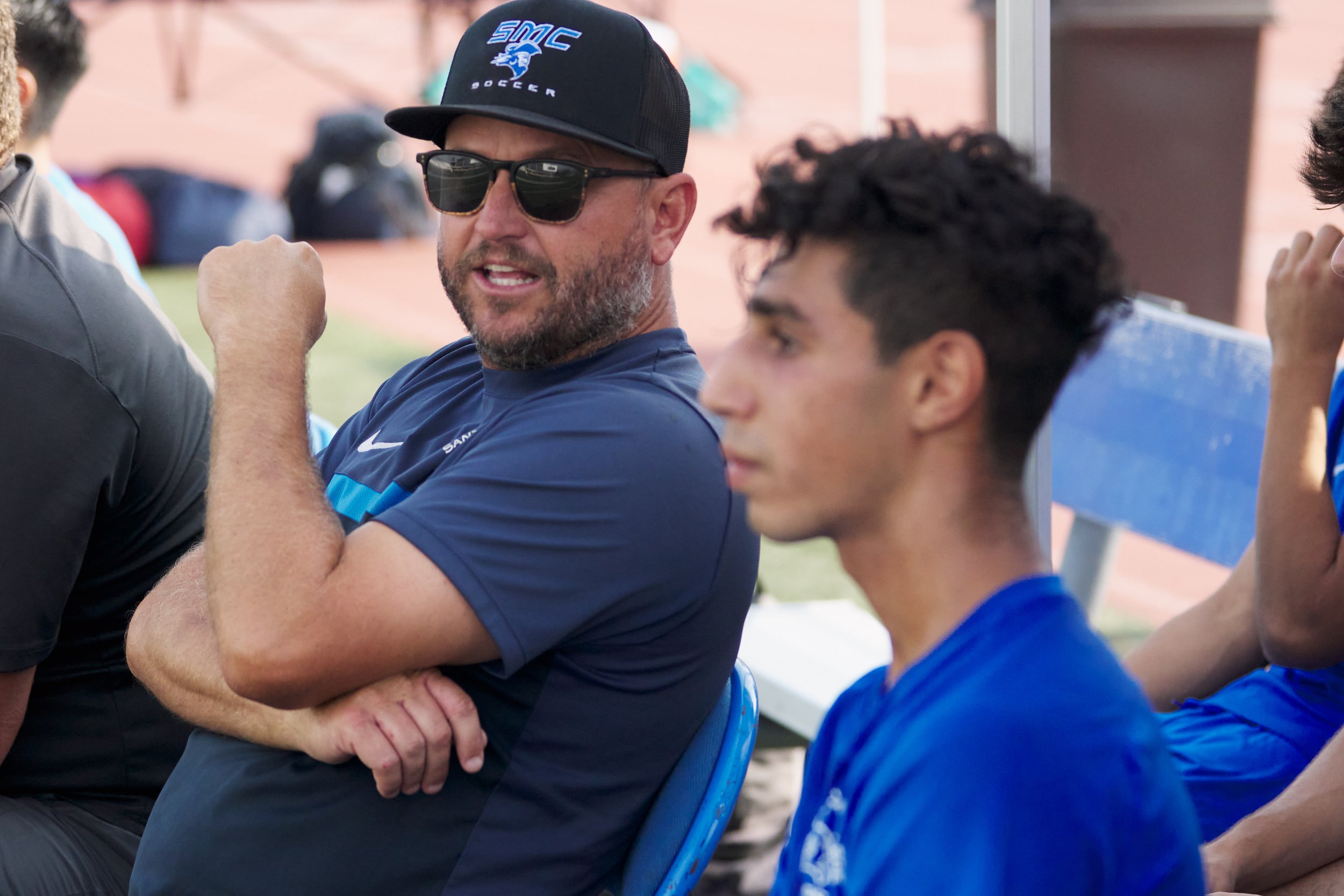  Santa Monica College Corsairs Men's Soccer Head Coach Tim Pierce speaks with Roey Kivity during the men's soccer match against the Santa Barbara City College Vaqueros on Tuesday, October 11, 2022, at Corsair Field in Santa Monica, Calif. The Corsair