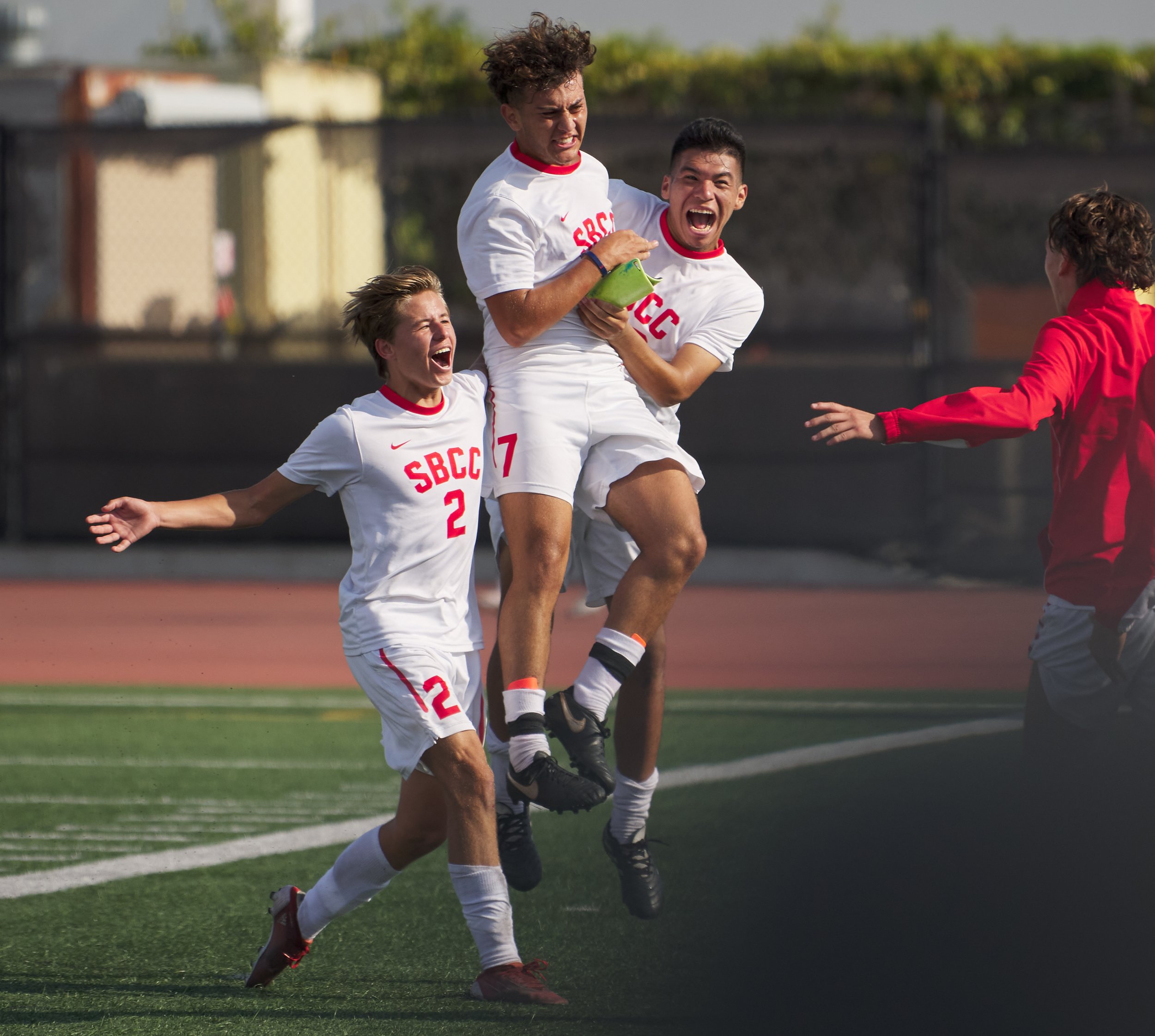  Santa Barbara City College Vaqueros Timo Jansen, Will Demirkol, and Yahir Cervantes celebrate scoring a goal during the men's soccer match against the Santa Monica College Corsairs on Tuesday, October 11, 2022, at Corsair Field in Santa Monica, Cali