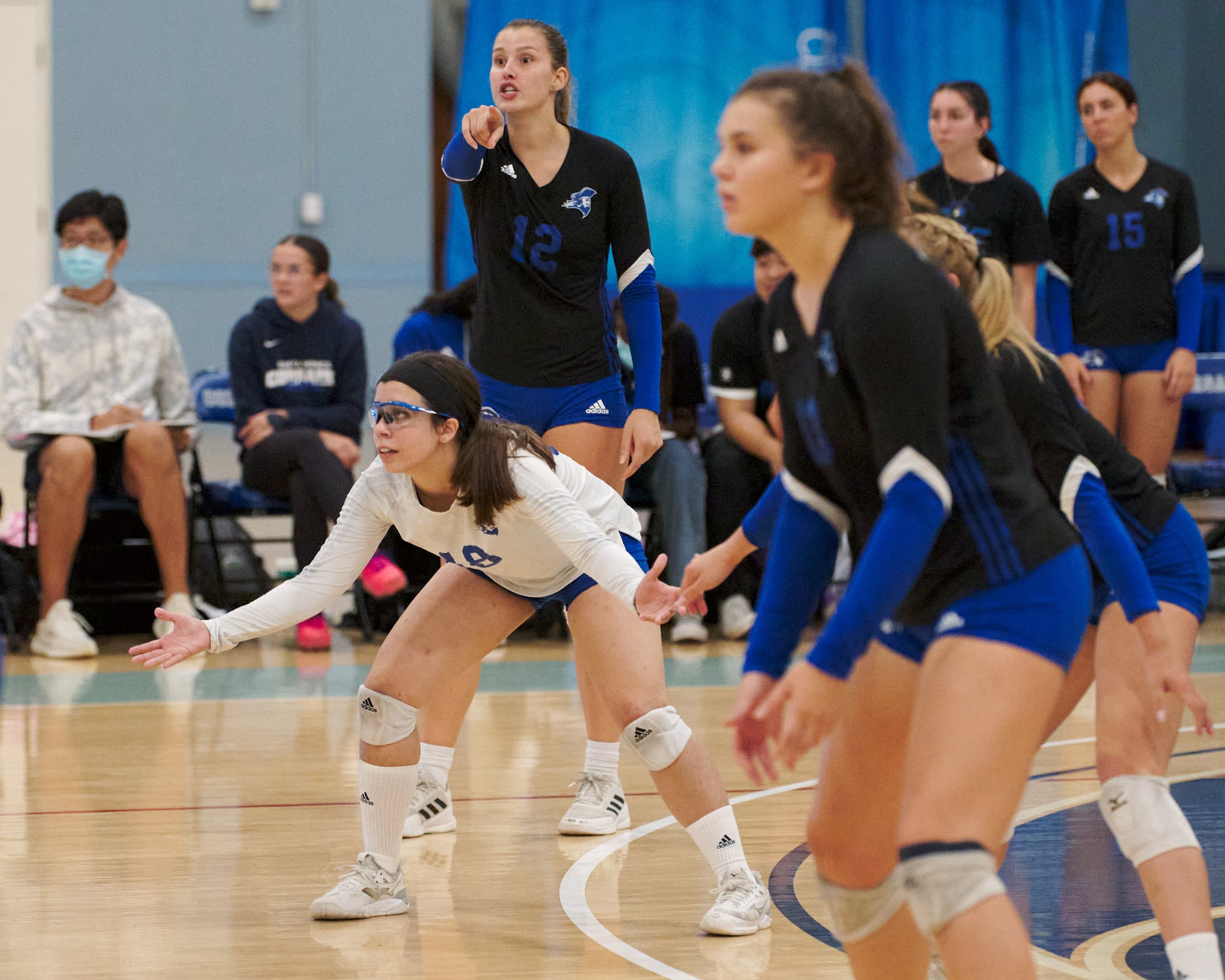  Santa Monica College Corsairs' Rachel Lallemand (squatting), Mia Paulson (12), and Mackenzie Wolff (right) during the women's volleyball match against the Antelope Valley College Marauders on Wednesday, Oct. 12, 2022, at the Corsair Gym in Santa Mon