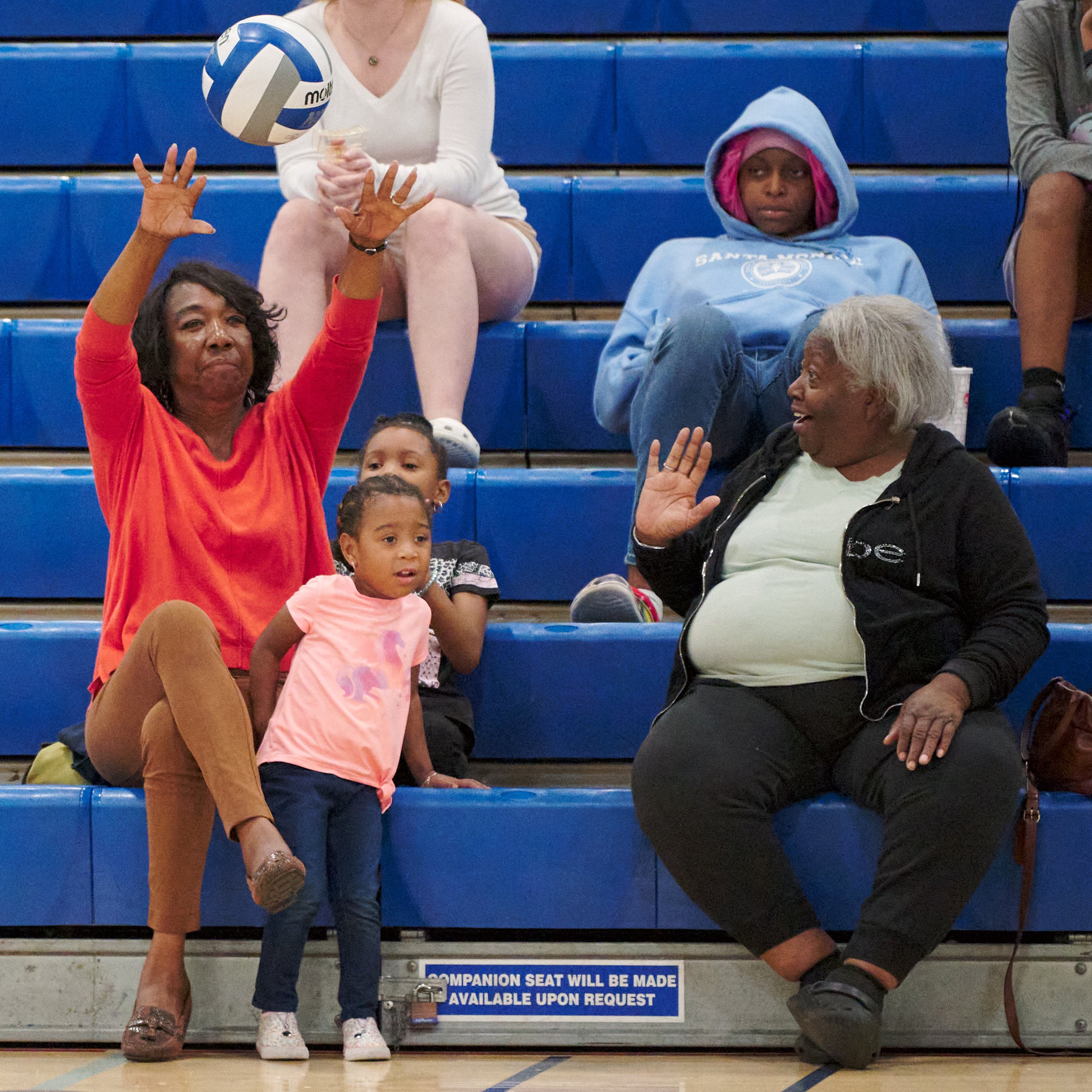  Daisy Smith, sitting with Aadya Goodman, Skylar Youngblood, and Annette Thompson, sends the ball back onto the court during the women's volleyball match between the Santa Monica College Corsairs and the Antelope Valley College Marauders on Wednesday