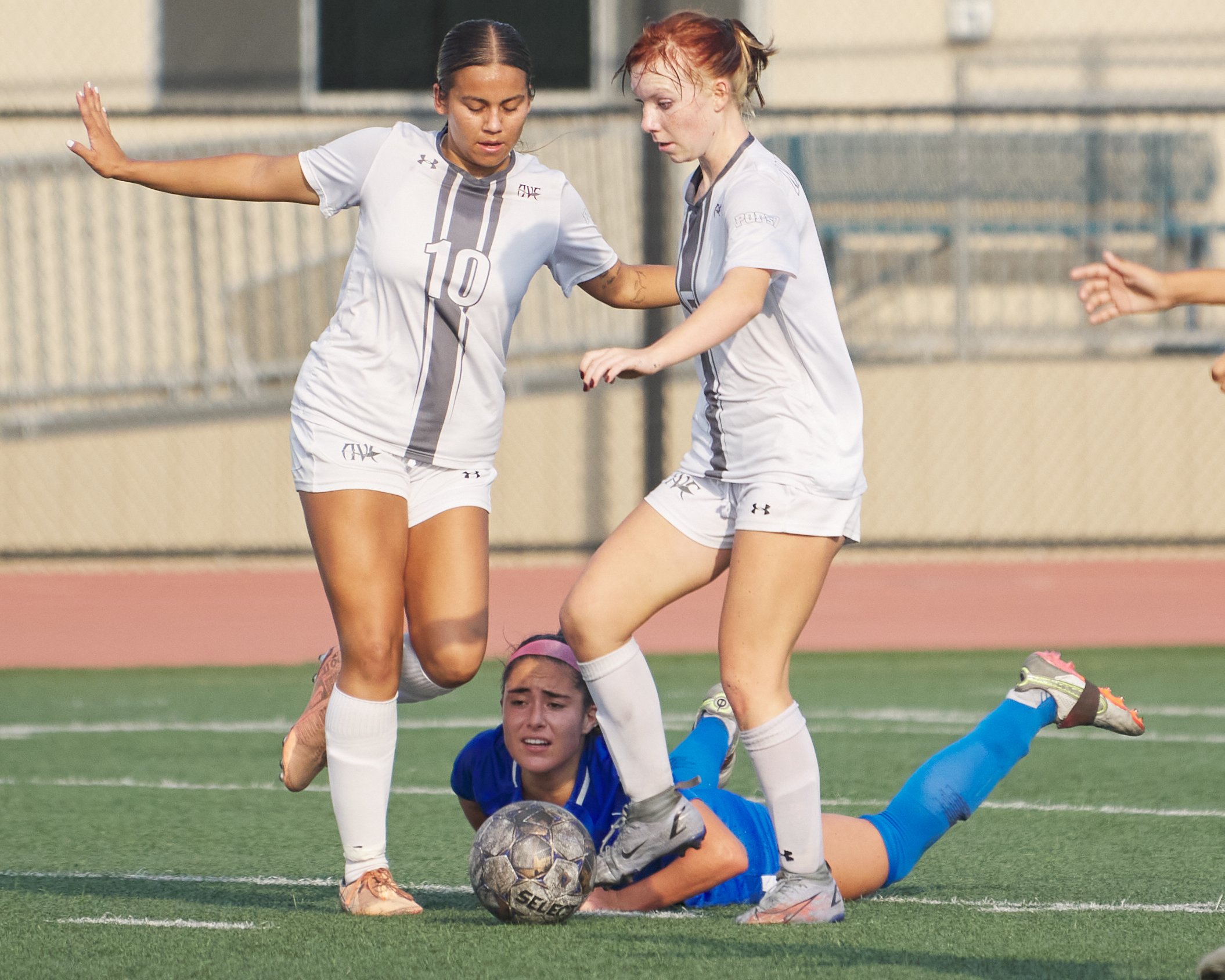  Antelope Valley College Marauders' Brianna Ortega (left) and Megan Salvesvold (right) take the ball from Santa Monica College Corsairs' Ali Alban (center) during the women's soccer match on Tuesday, Oct. 11, 2022, at Corsair Field in Santa Monica, C