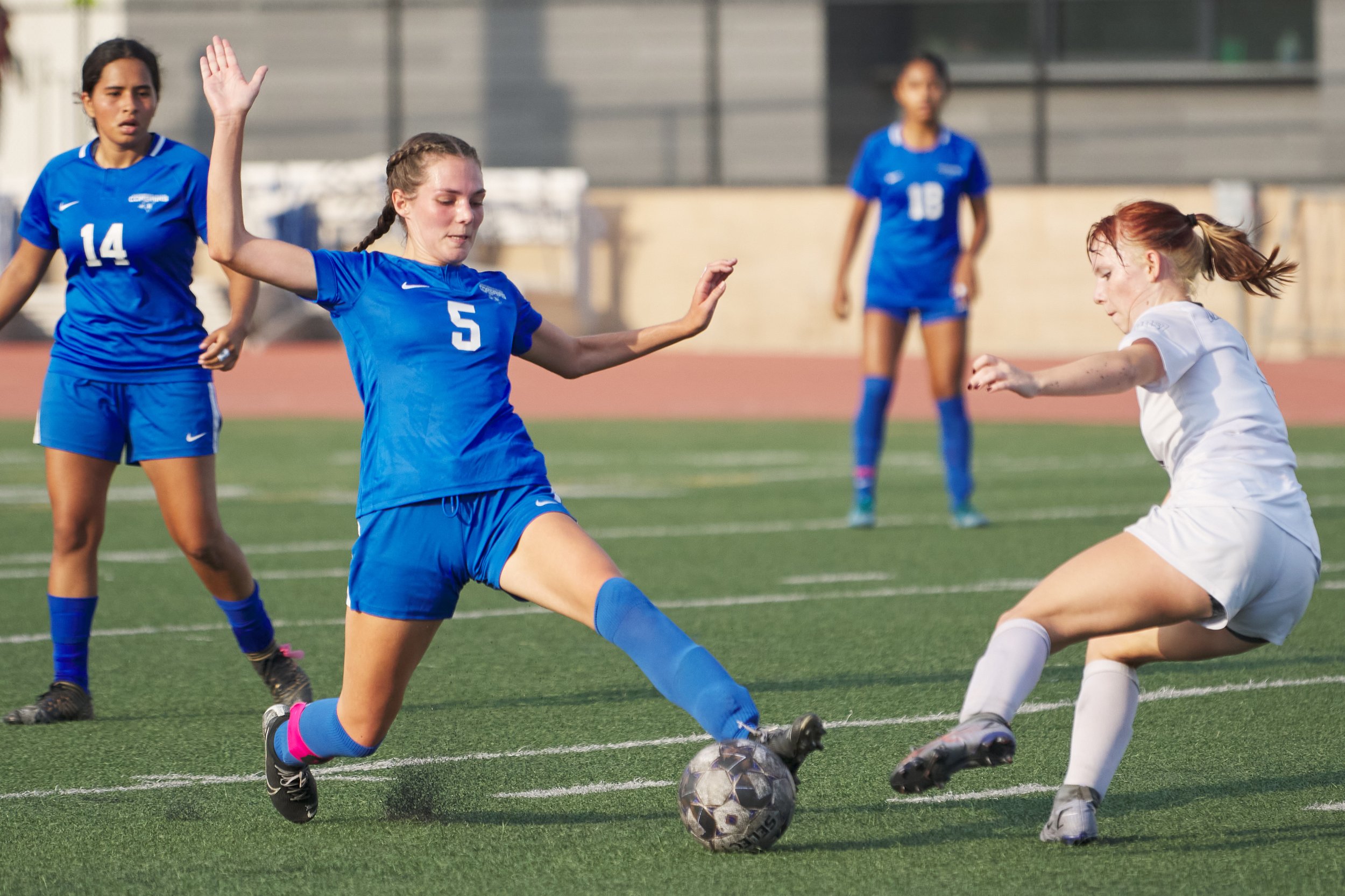  Santa Monica College Corsairs' Charlie Kayem (center) attempts to keep the ball from Antelope Valley College Marauders' Megan Salvesvold (right) during the women's soccer match on Tuesday, Oct. 11, 2022, at Corsair Field in Santa Monica, Calif. The 