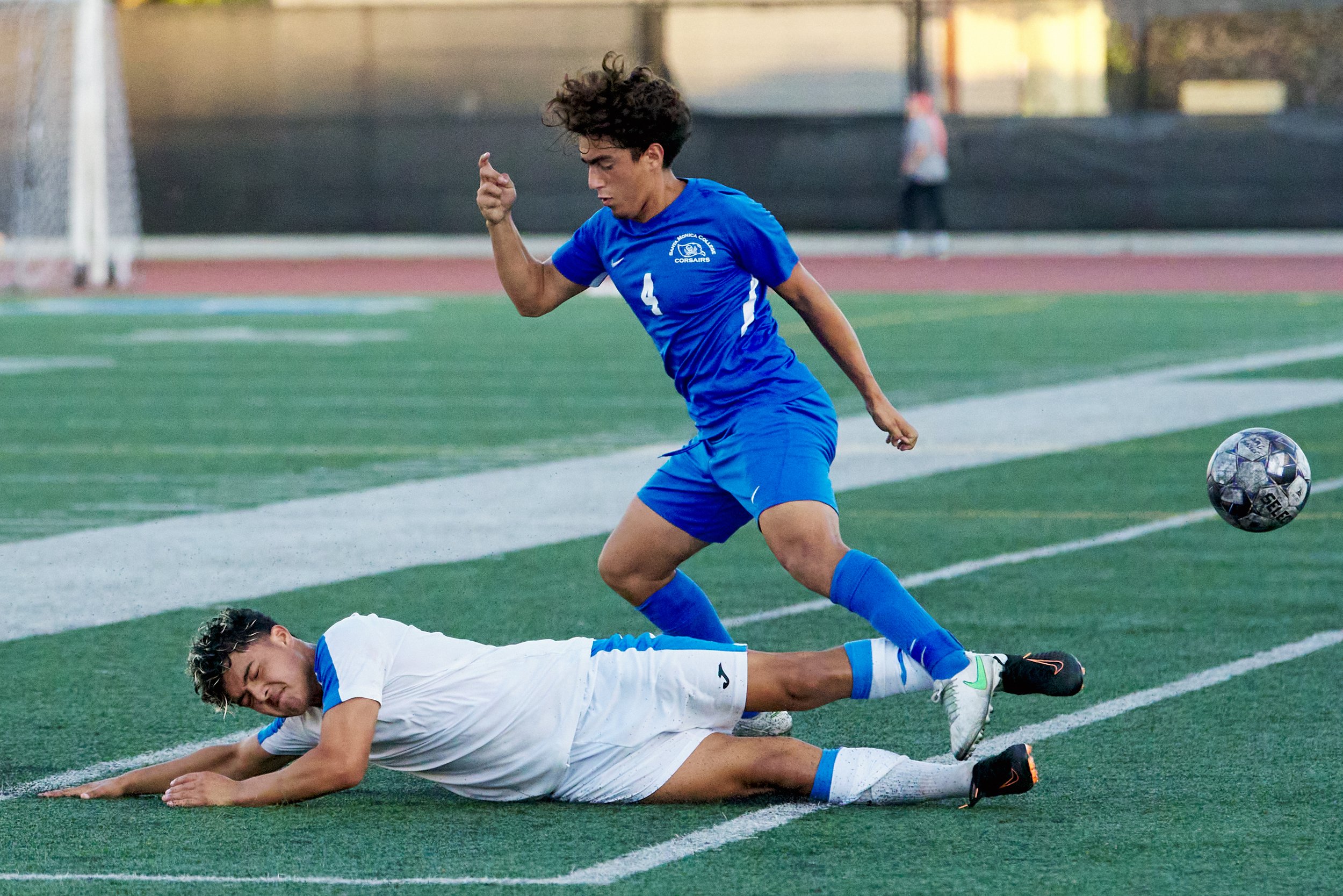  Oxnard College Condors' Andy Cruz got a yellow card for this slide into a collision at Santa Monica College Corsairs' Jose Arias during the men's soccer match on Tuesday, Oct. 18, 2022, at Corsair Field in Santa Monica, Calif. The Corsairs lost 0-3.