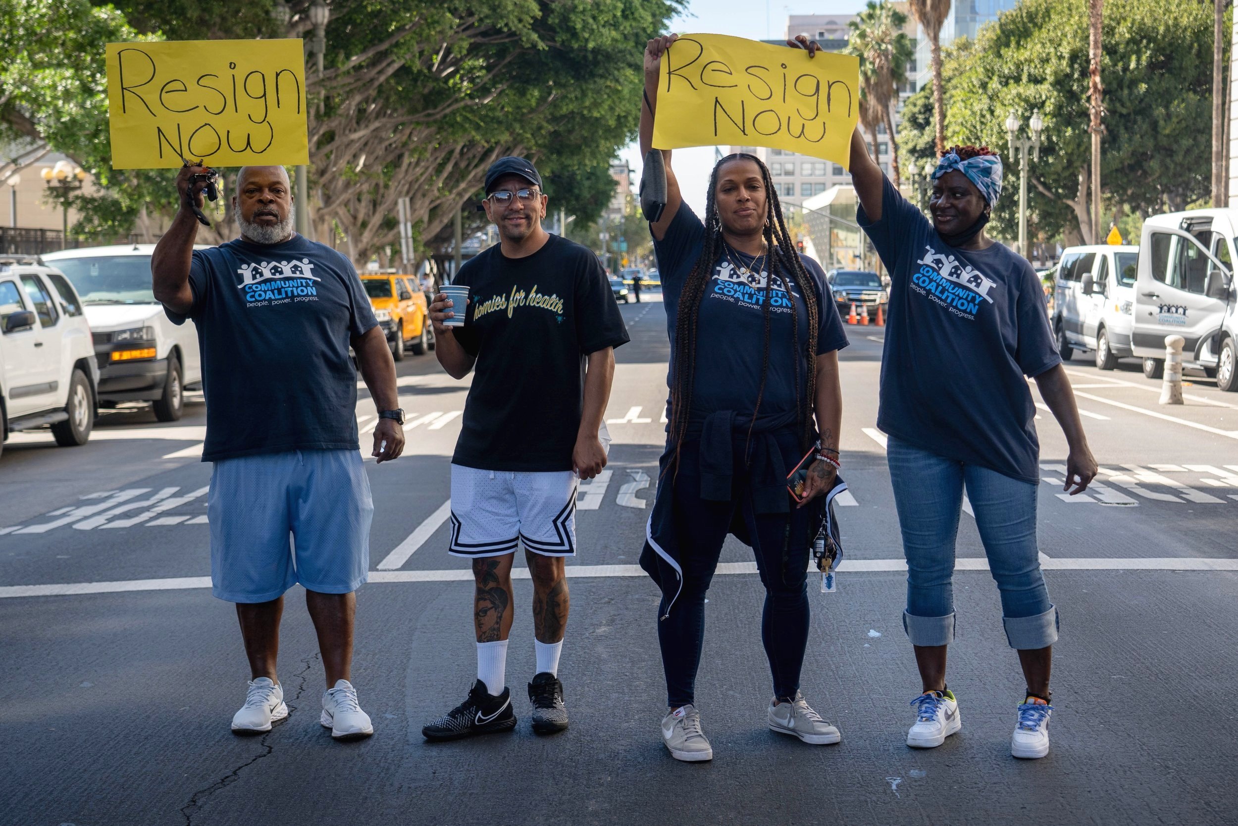  Demonstrators display protest messages at the entrance of Los Angeles City Hall Tuesday, Oct 18 2022. Multiple activist organizations are demanding the resignation of council members caught making racially charged comments.(Anthony Clingerman | The 