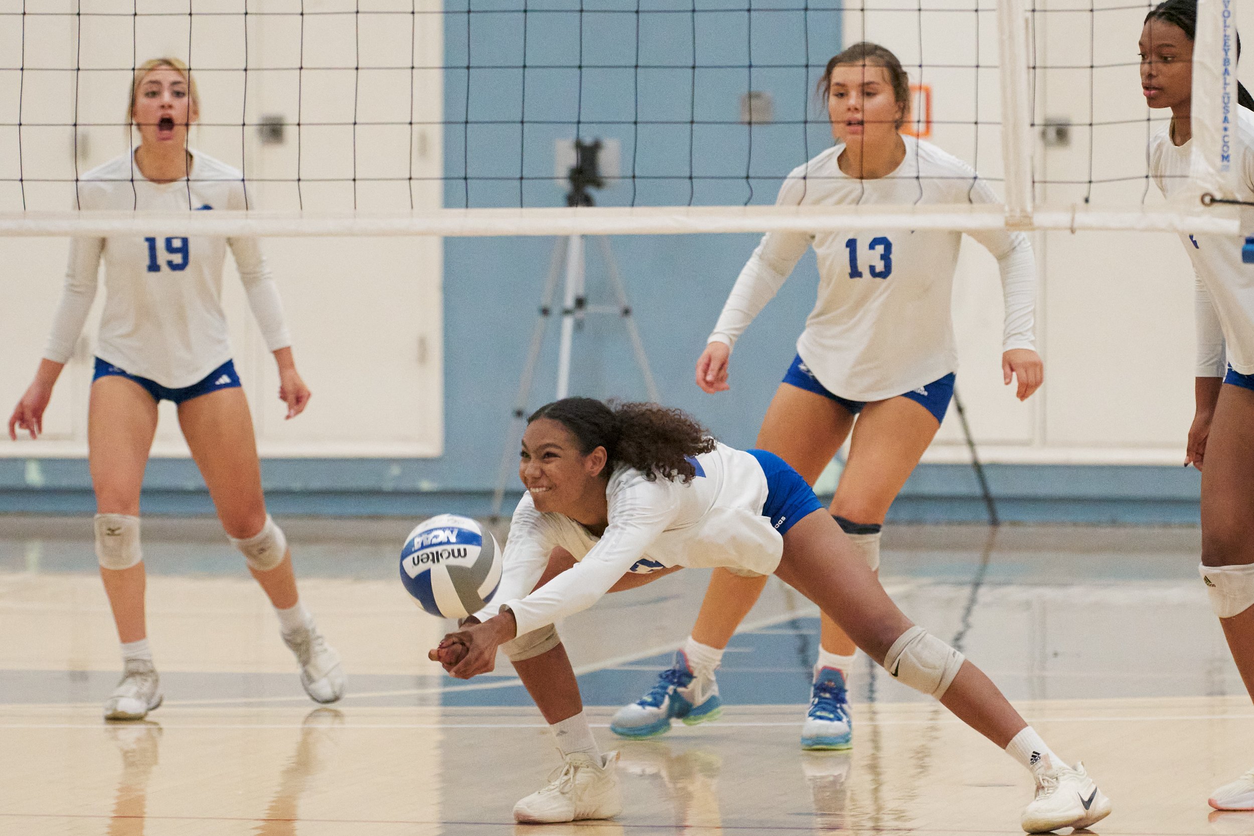  Santa Monica College Corsairs' Rain Martinez (center) dives for the ball, with Scheala Nielsen, Mackenzie Wolff, and Zarha Stanton behind her during the women's volleyball match against the Citrus College Owls on Wednesday, Oct. 19, 2022, at Corsair