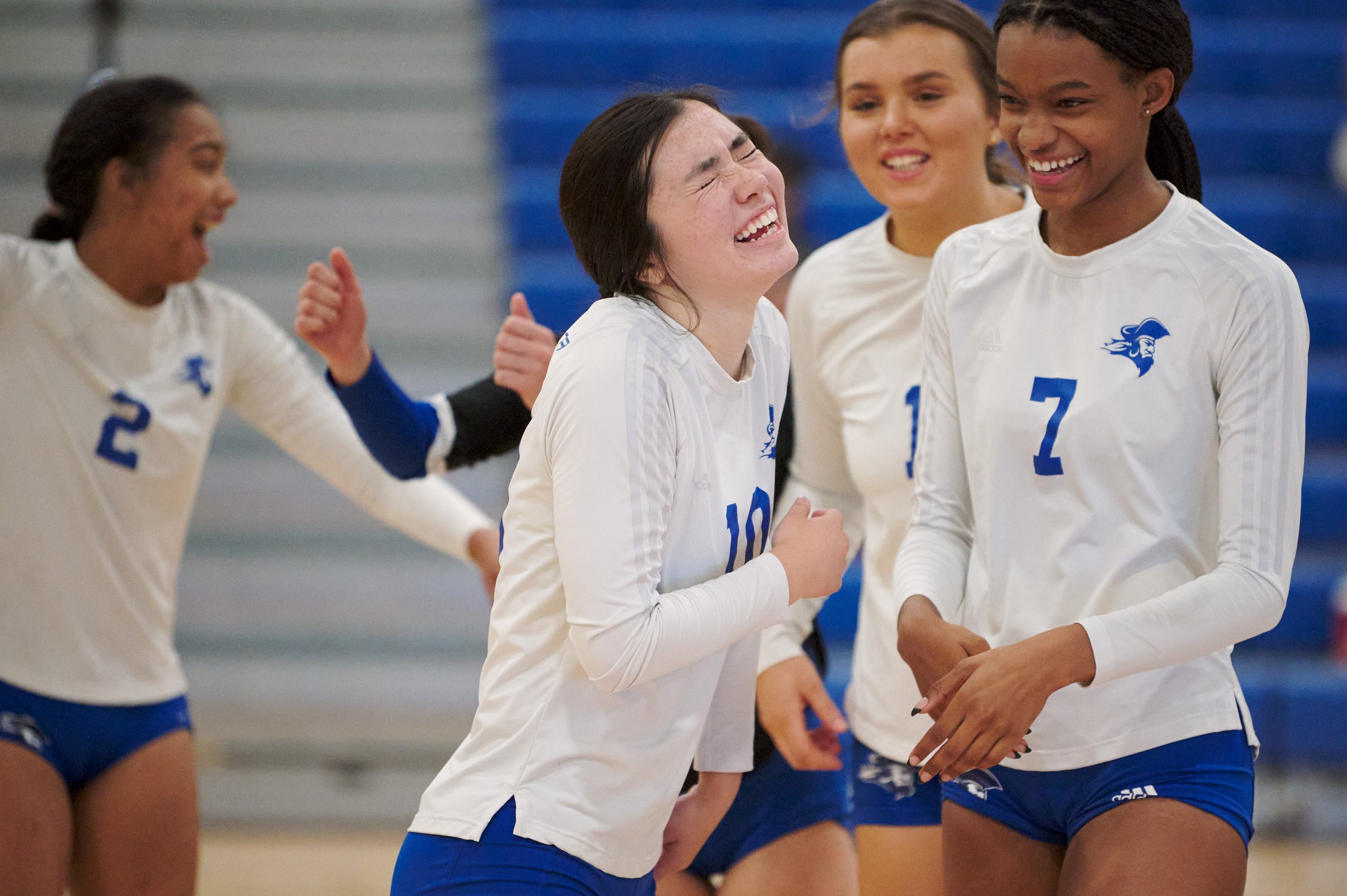  Santa Monica College Corsairs' Amaya Bernardo, Mackenzie Wolff (right center), and Zarha Stanton celebrate Sophia Odle (center) for scoring three times in a row from serves during the women's volleyball match against the Citrus College Owls on Wedne