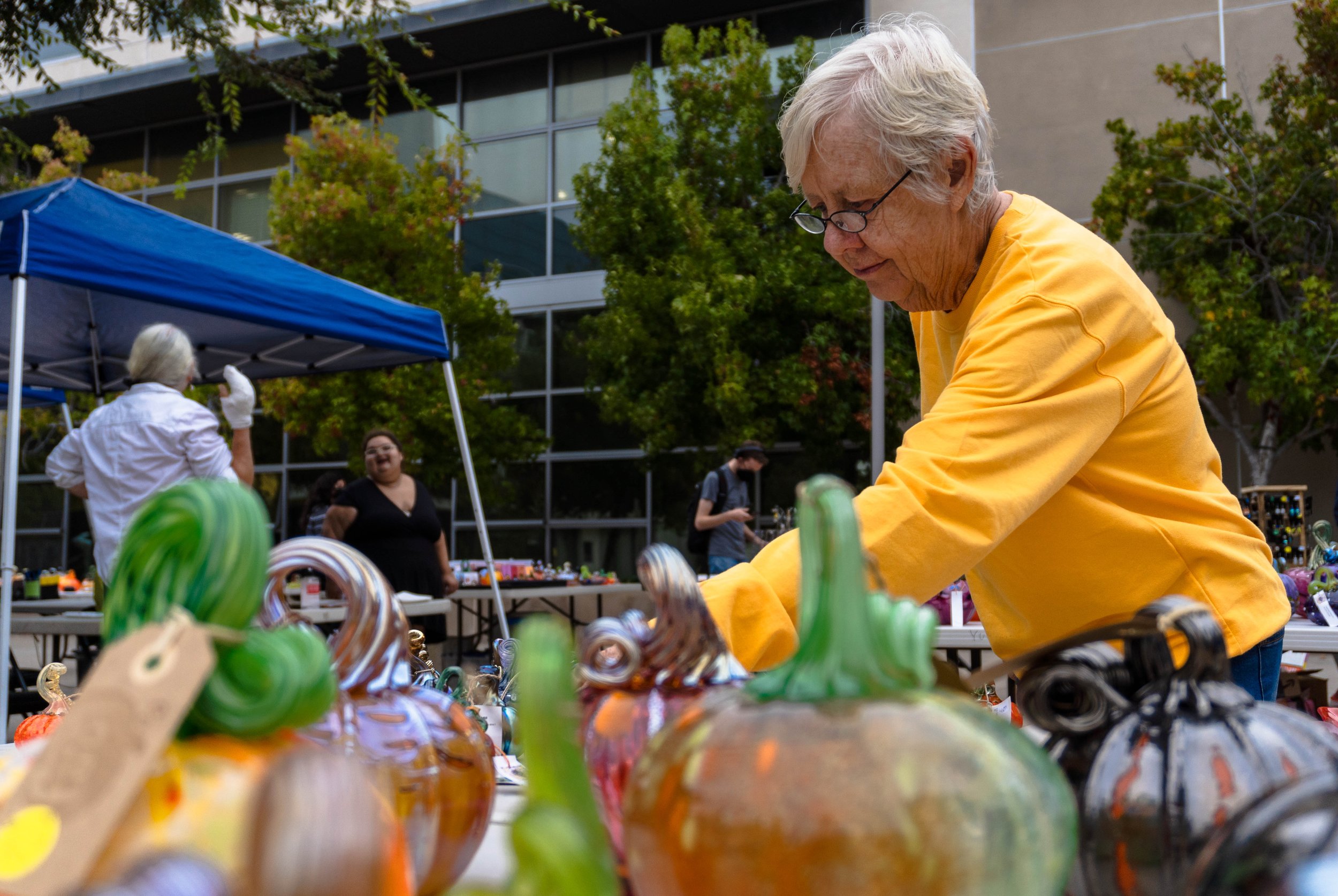  Santa Monica resident Linn Wile walked from her home to the Santa Monica College (SMC) campus for the SMC Art Department's annual Glass Pumpkin Sales. "It's beautiful, I wish the sun was shining and it would be even prettier." 30% of sales earned wi