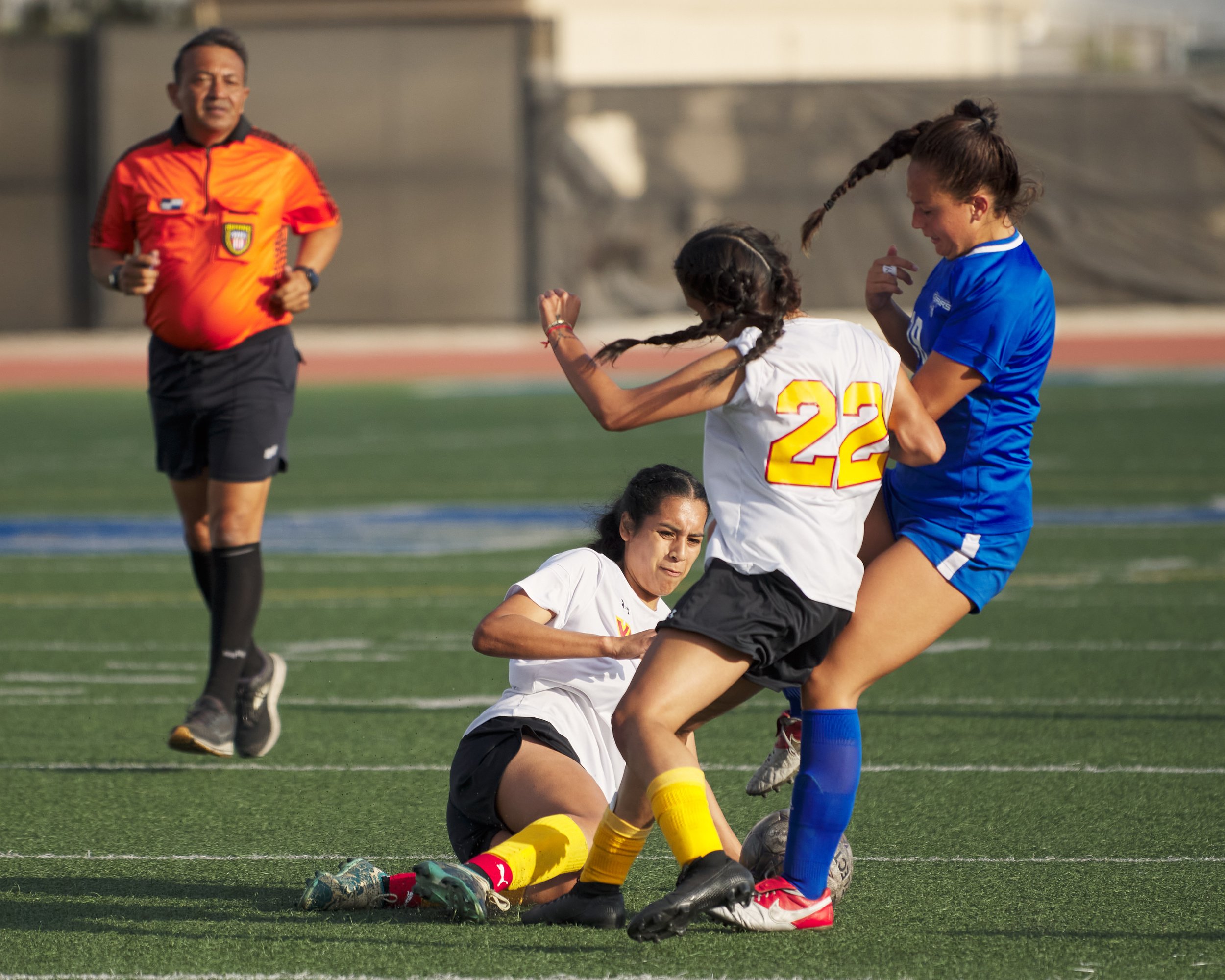  Glendale Community College Vaqueros' Stephanie Portillo fouls her way into a collsion with Santi Eldimiri and Santa Monica College Corsairs' Layla Perovich during the women's soccer match on Friday, Oct. 21, 2022, at Corsair Field in Santa Monica, C