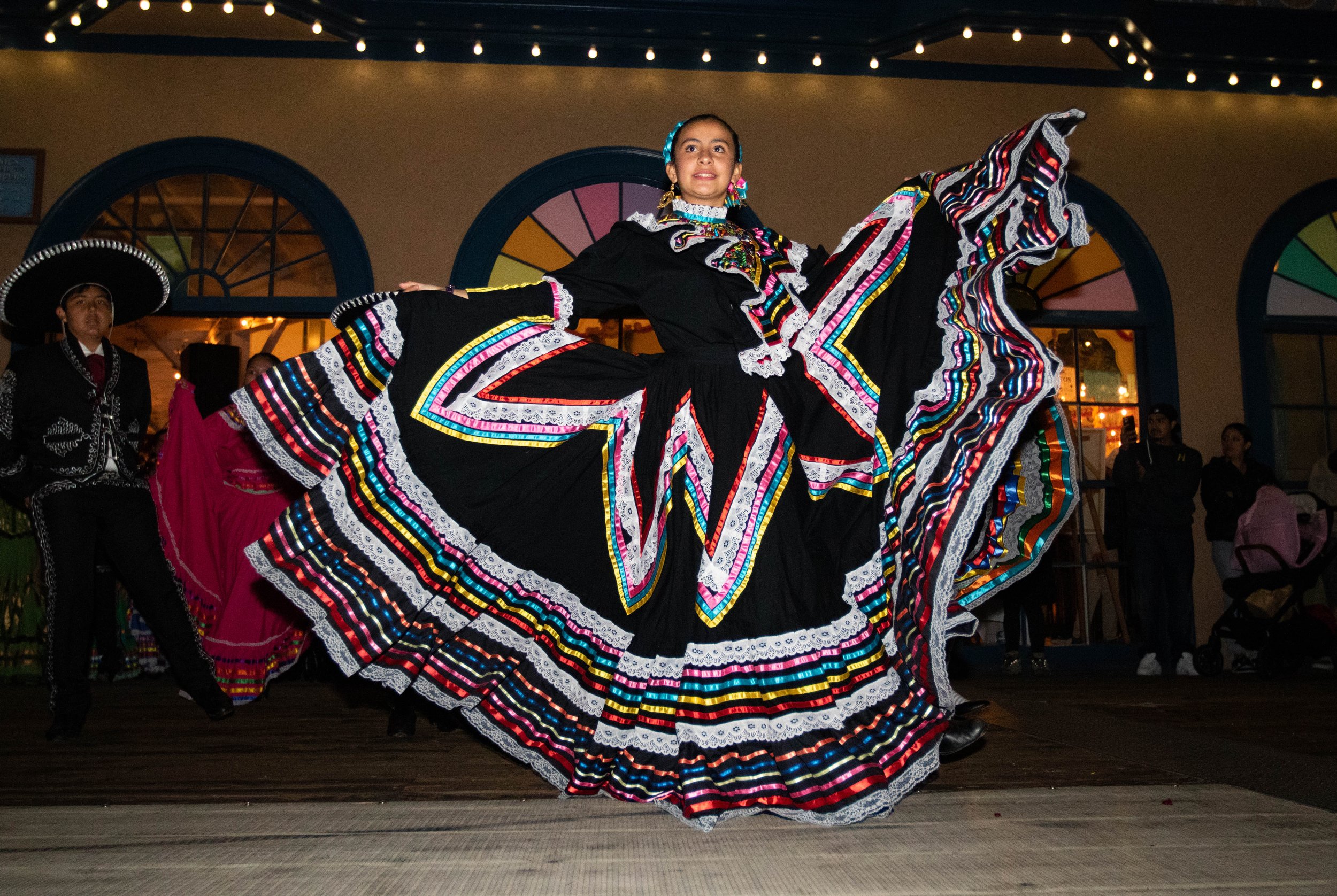  A young Ballet Folklorico performer at the Santa Monica Pier Día de los Muertos celebration on Nov. 2, 2022. In collaboration with artists, Daniel Alonzo and Sylvia Sanchez, Santa Monica Pier showcased a two-day public art installation in which comm