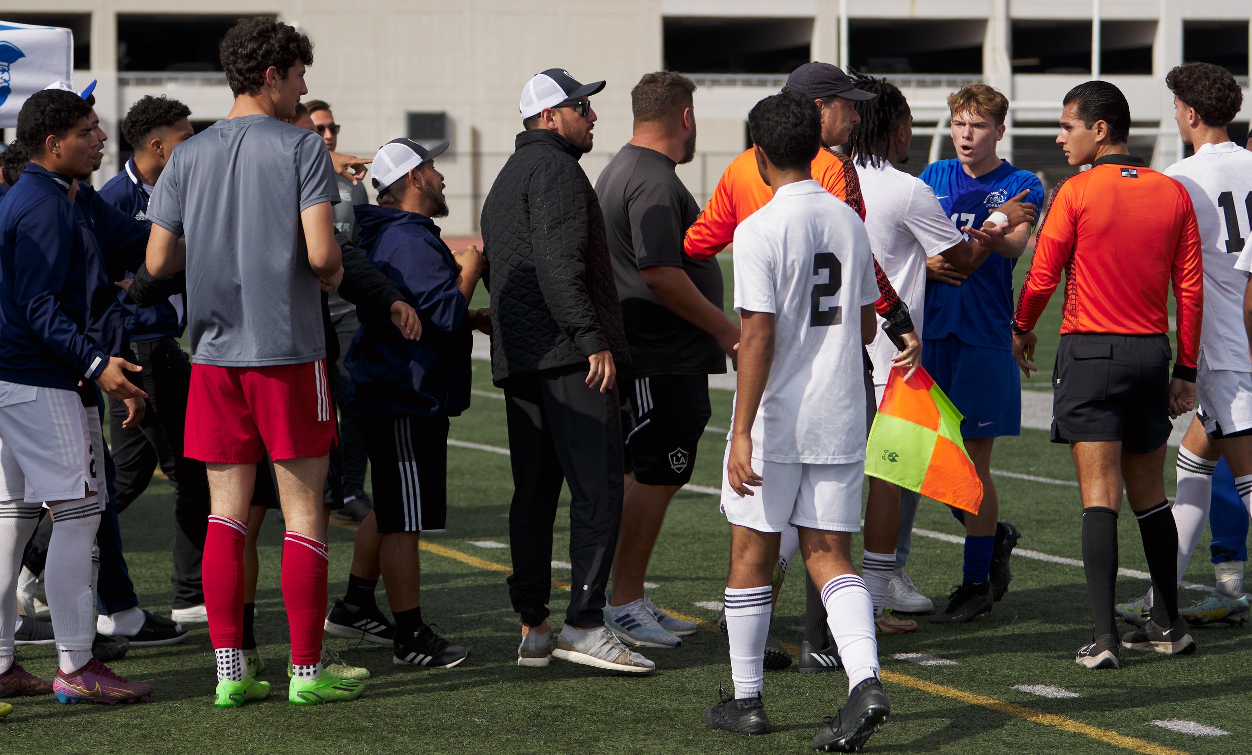  A fight broke out when Santa Monica College Corsairs' Taj Winnard (second from right) went to retrieve the ball from the tent of the Los Angeles Mission College Eagles during the men's soccer match on Tuesday, Nov. 1, 2022, at Corsair Field in Santa