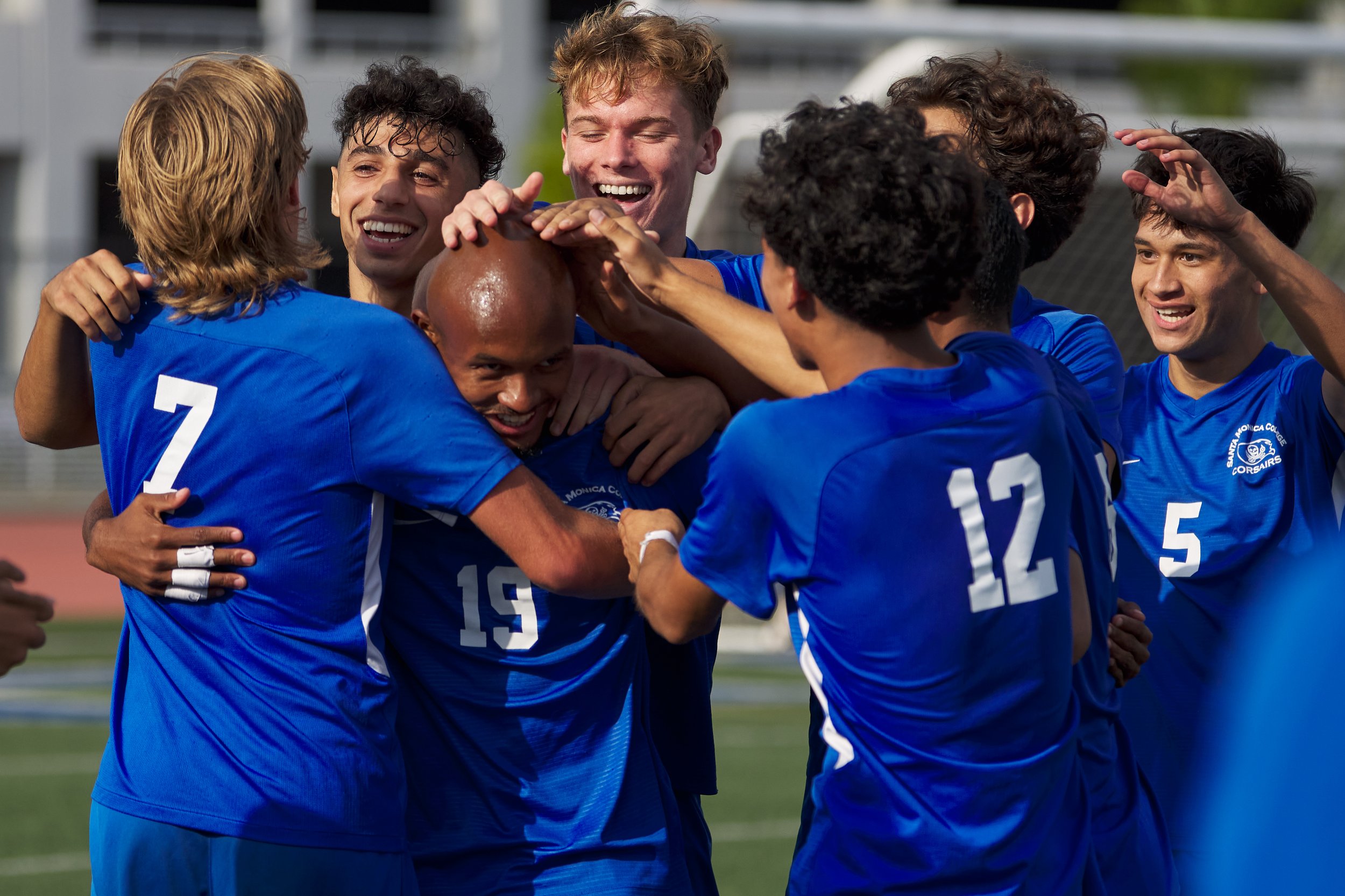  Members of the Santa Monica College Corsairs Men's Soccer team celebrate Menes Jahra's (19) goal during the match against the Los Angeles Mission College Eagles on Tuesday, Nov. 1, 2022, at Corsair Field in Santa Monica, Calif. The Corsairs won 3-0.