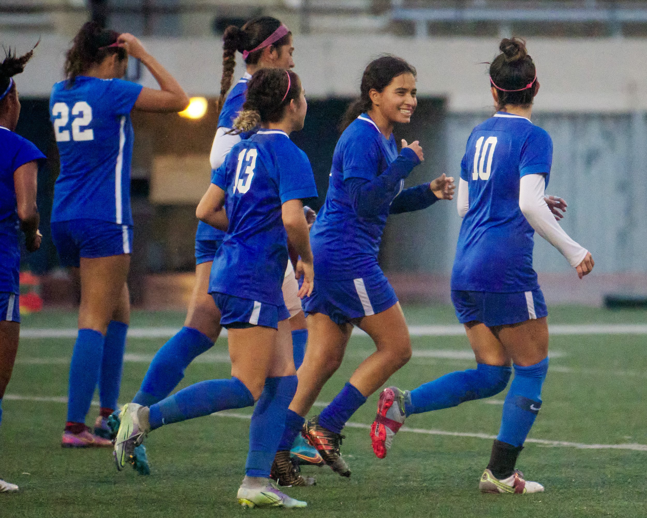  Santa Monica College Corsairs' Vashti Zuniga (second from right) and members of the women's soccer team celebrate Ali Alban's (right) second goal of the match against the Citrus College Owls on Tuesday, Nov. 8, 2022, at Corsair Field in Santa Monica