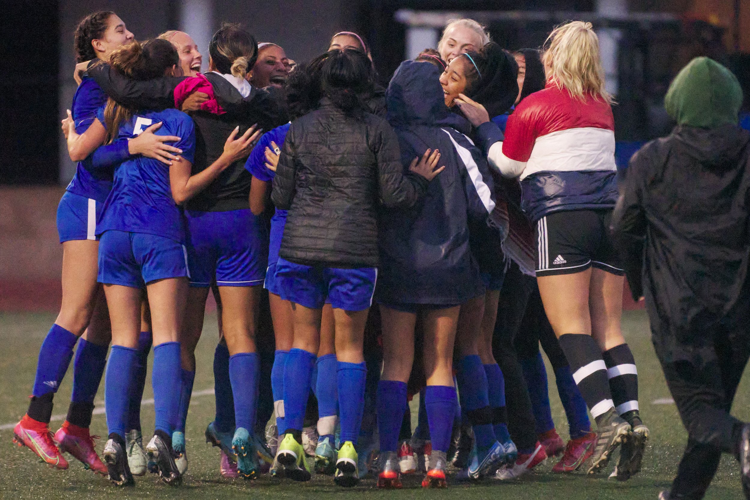 The Santa Monica College Corsairs Women's Soccer team celebrate their win with a big group hug at the end of the match against the Citrus College Owls on Tuesday, Nov. 8, 2022, at Corsair Field in Santa Monica, Calif. The Corsairs won 3-1. (Nicholas