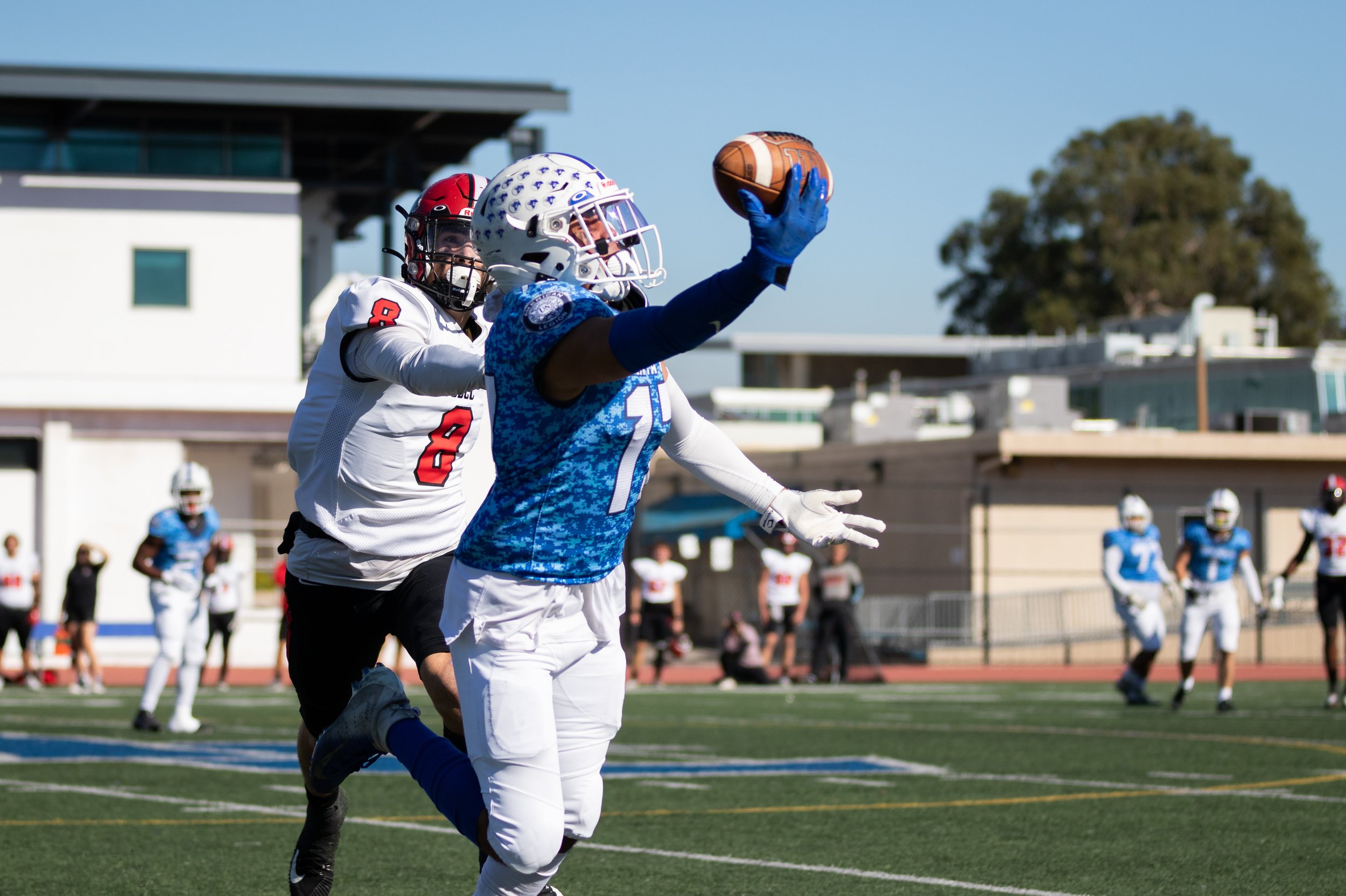  Santa Monica College Corsair Jerad Braff (17, right) attempting to complete a pass as Santa Monica City College VanqueroKai Singleton (8, left) pushes him out of bounds during the first quarter of a recent home game on Saturday, Nov. 12, 2022, at Sa