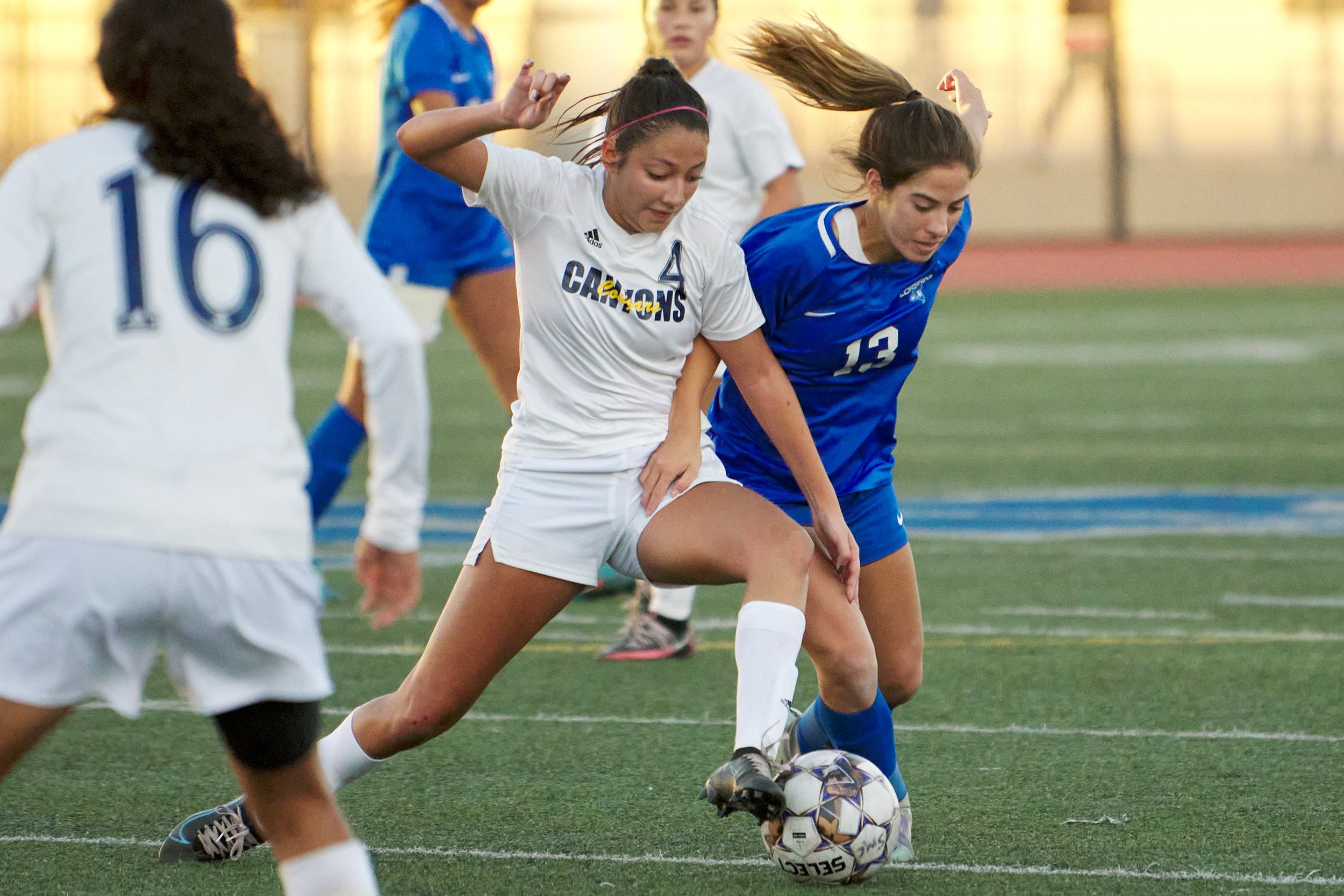  College of the Canyons Cougars' Giselle Gomez maintains control of the ball away from Santa Monica College Corsairs' Sophie Doumitt during the women's soccer match on Thursday, Nov. 10, 2022, at Corsair Field in Santa Monica, Calif. The Corsairs los