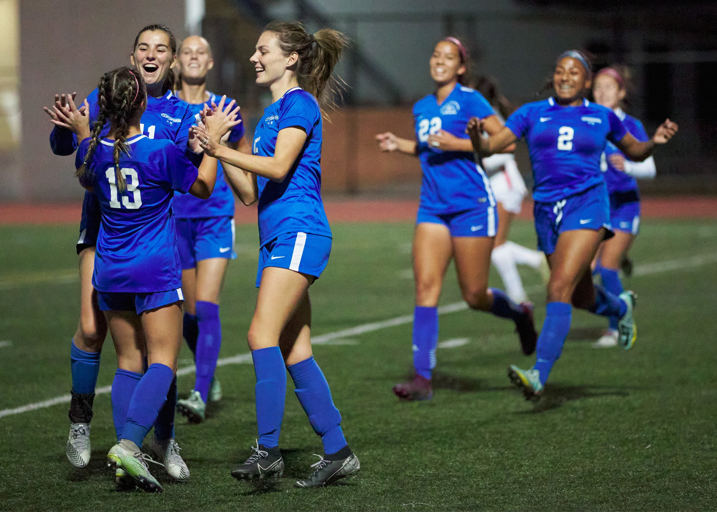  Members of the Santa Monica College Corsairs Women's Soccer team rush to celebrate the goal scored by Sophie Doumitt (13) during the soccer match against the Bakersfield College Renegades on Wednesday, Nov. 16, 2022, at Corsair Field in Santa Monica