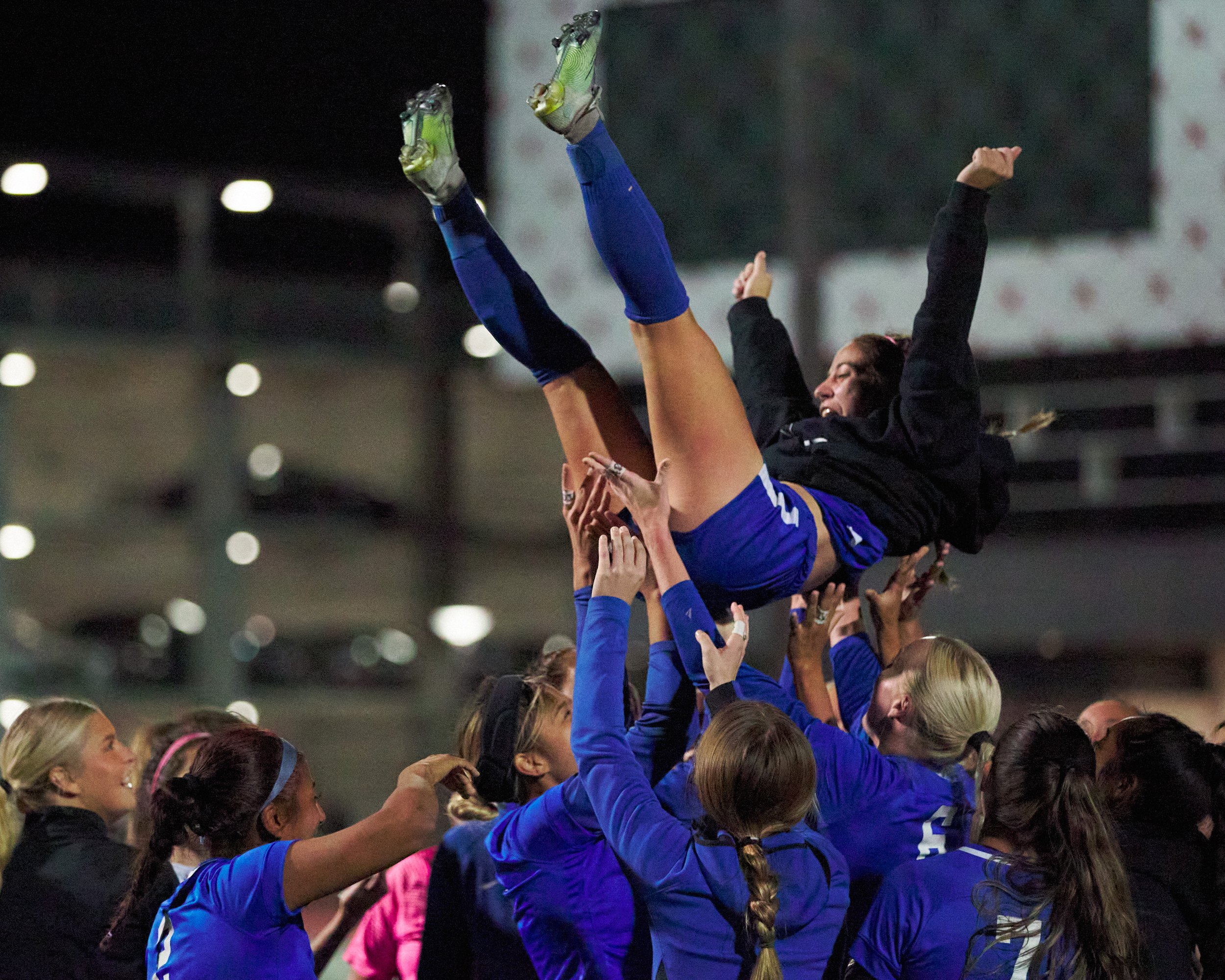  The Santa Monica College Corsairs Women's Soccer team toss Sophie Doumitt, who, from a corner kick, scored the sole goal of the evening, into the air in celebration of their 1-0 win against the Bakersfield College Renegades on Wednesday, Nov. 16, 20
