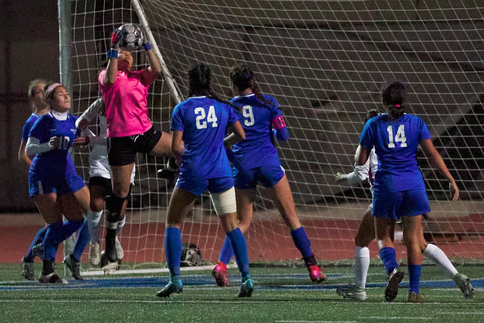  Santa Monica College Corsairs' goalie Johana Ventureno (in pink) saves the ball during the women's soccer match against the Bakersfield College Renegades on Wednesday, Nov. 16, 2022, at Corsair Field in Santa Monica, Calif. The Corsairs won 1-0. (Ni