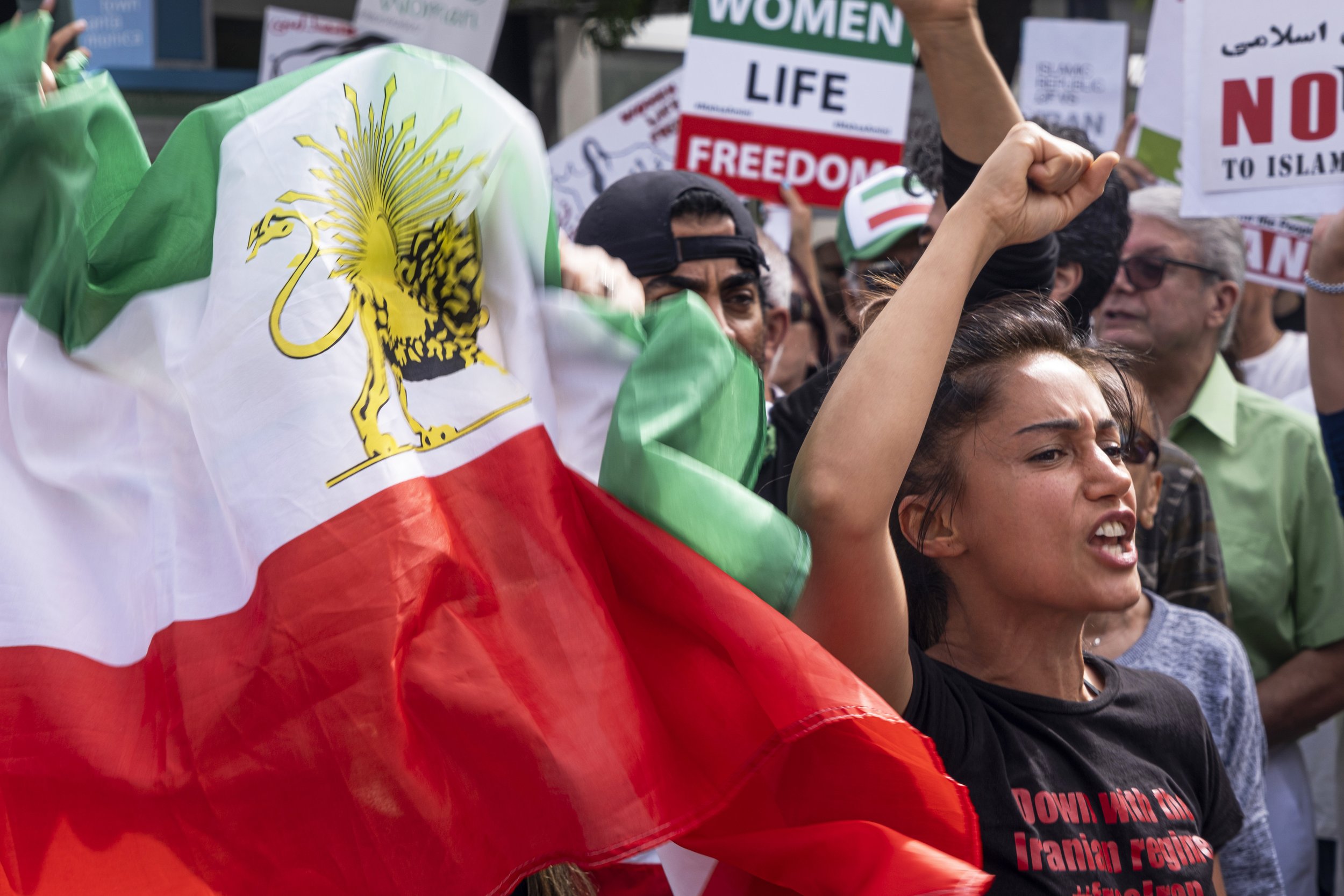  Solmaz Atash chants “zan, zendegi, azadi,” which means “woman, life, freedom,” at the March for Iran, at Third Street Promenade in Santa Monica, Calif., on Saturday, Oct. 8. (Anna Sophia Moltke | The Corsair) 