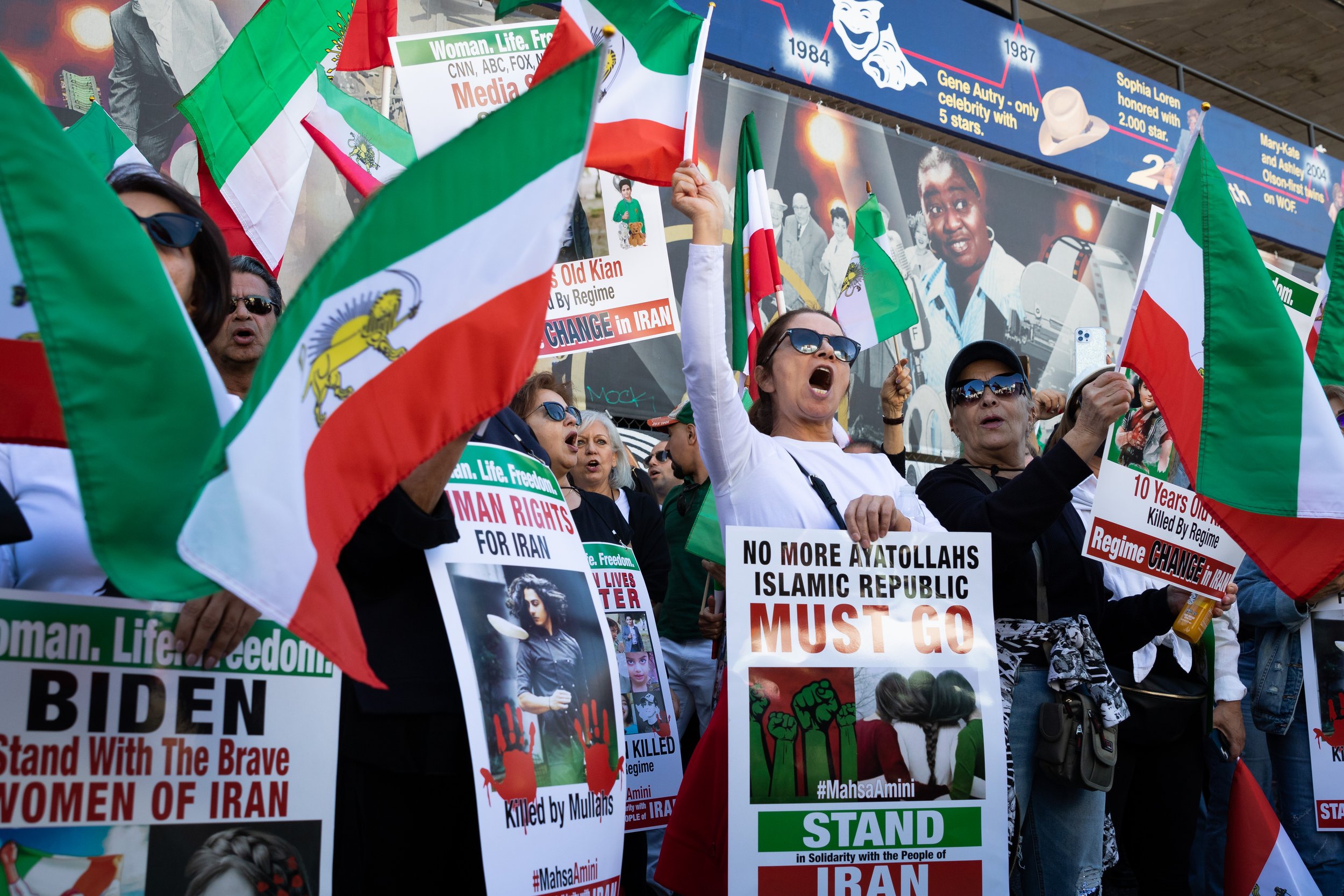  Freedom for Iran rally goers chanting, singing, and listening to speakers before the march begins on Hollywood Blvd, in Hollywood, Calif. on Saturday, Nov. 19, 2022. This rally is part of a global movement that has taken place since the death of Mah
