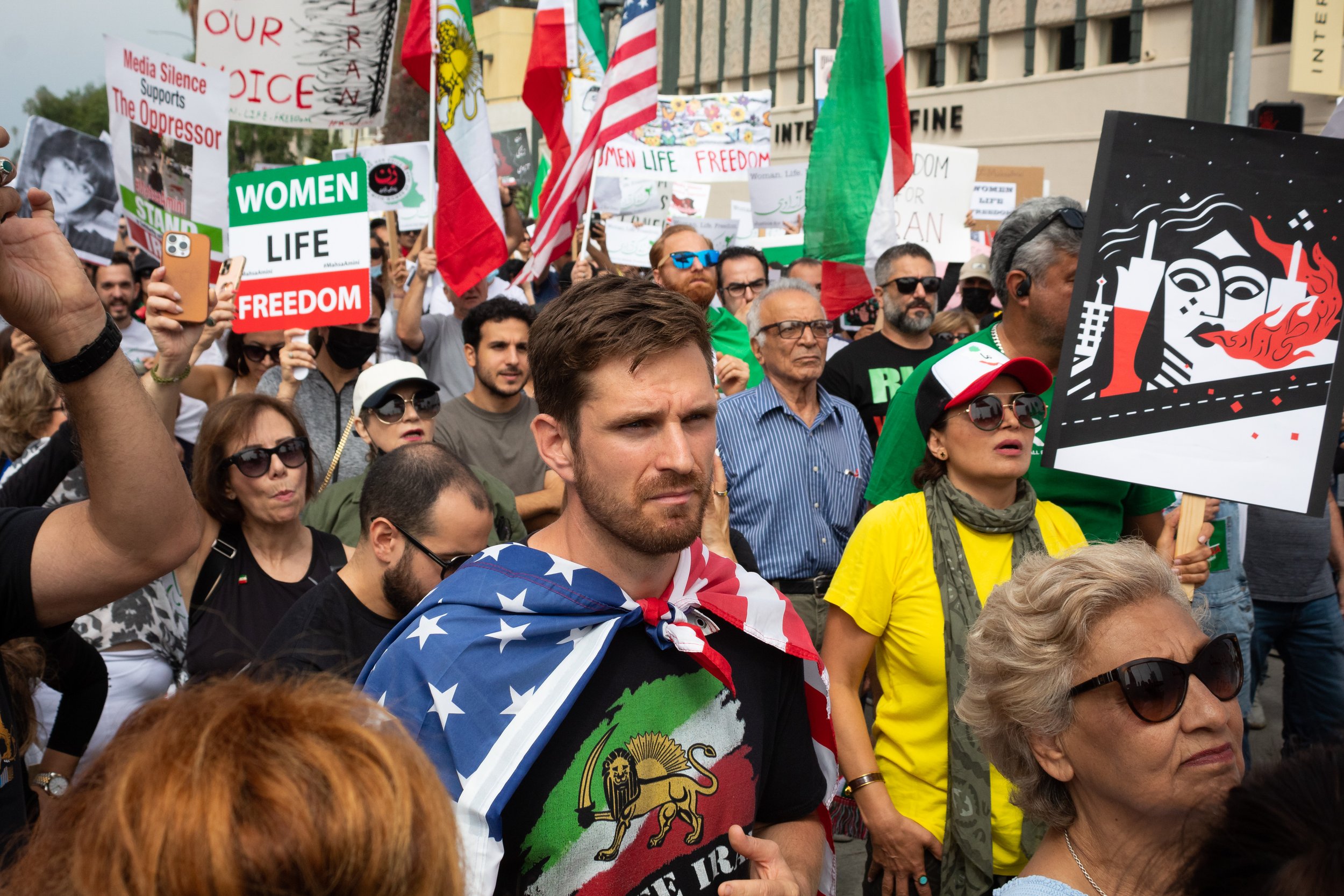  Kevin Robinson wearing an American flag as a cap during the Freedom for Iran rally on 3rd Street and Wilshire Blvd in Santa Monica, Calif. on Oct. 8, 2022. (Caylo Seals | The Corsair) 