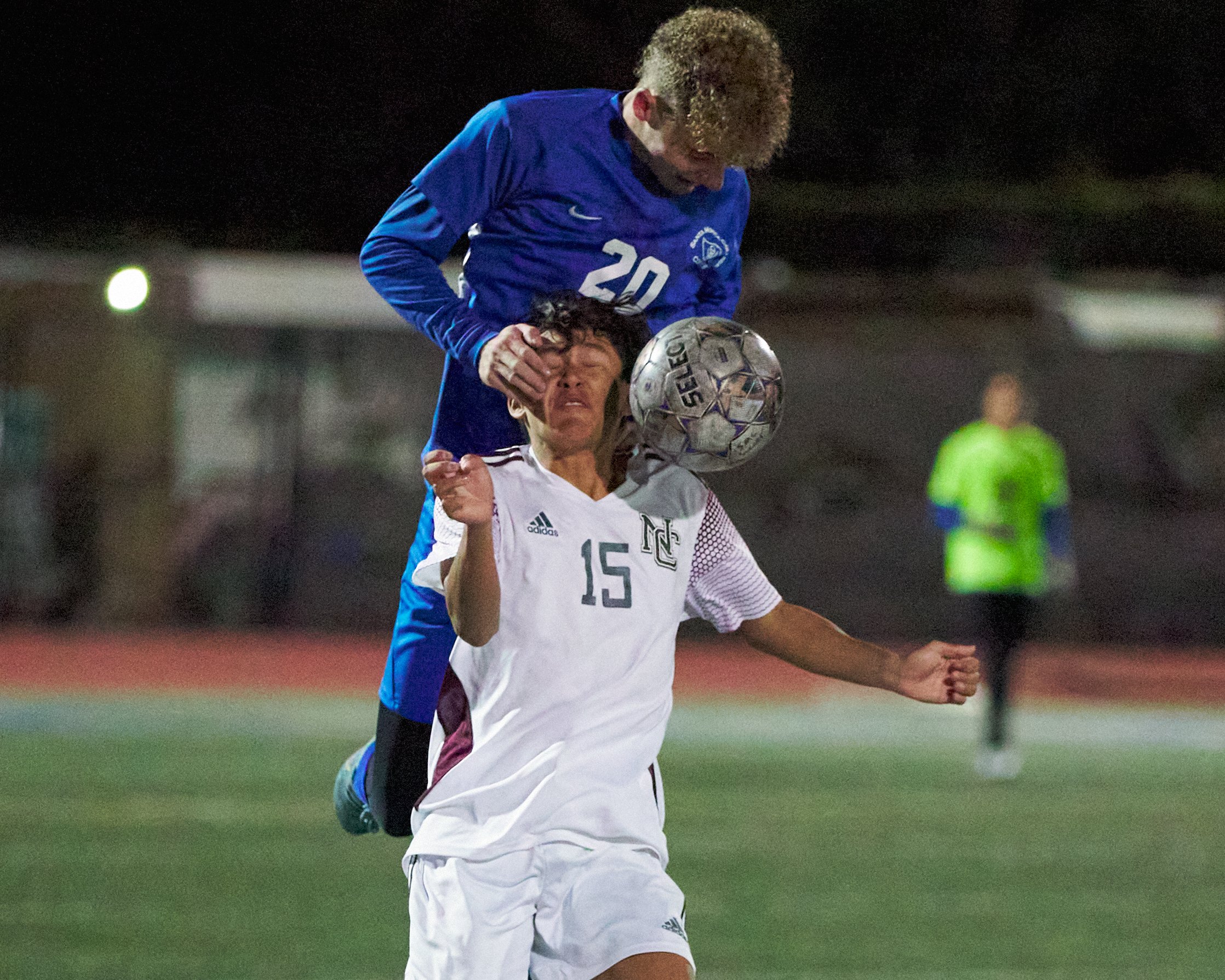  Santa Monica College Corsairs' Marcus Hevesy-Rodriguez (top) and Norco College Mustangs' Andrew Montes (bottom) attempt to head the ball during the men's soccer match on Saturday, Nov. 19, 2022, at Corsair Field in Santa Monica, Calif. (Nicholas McC