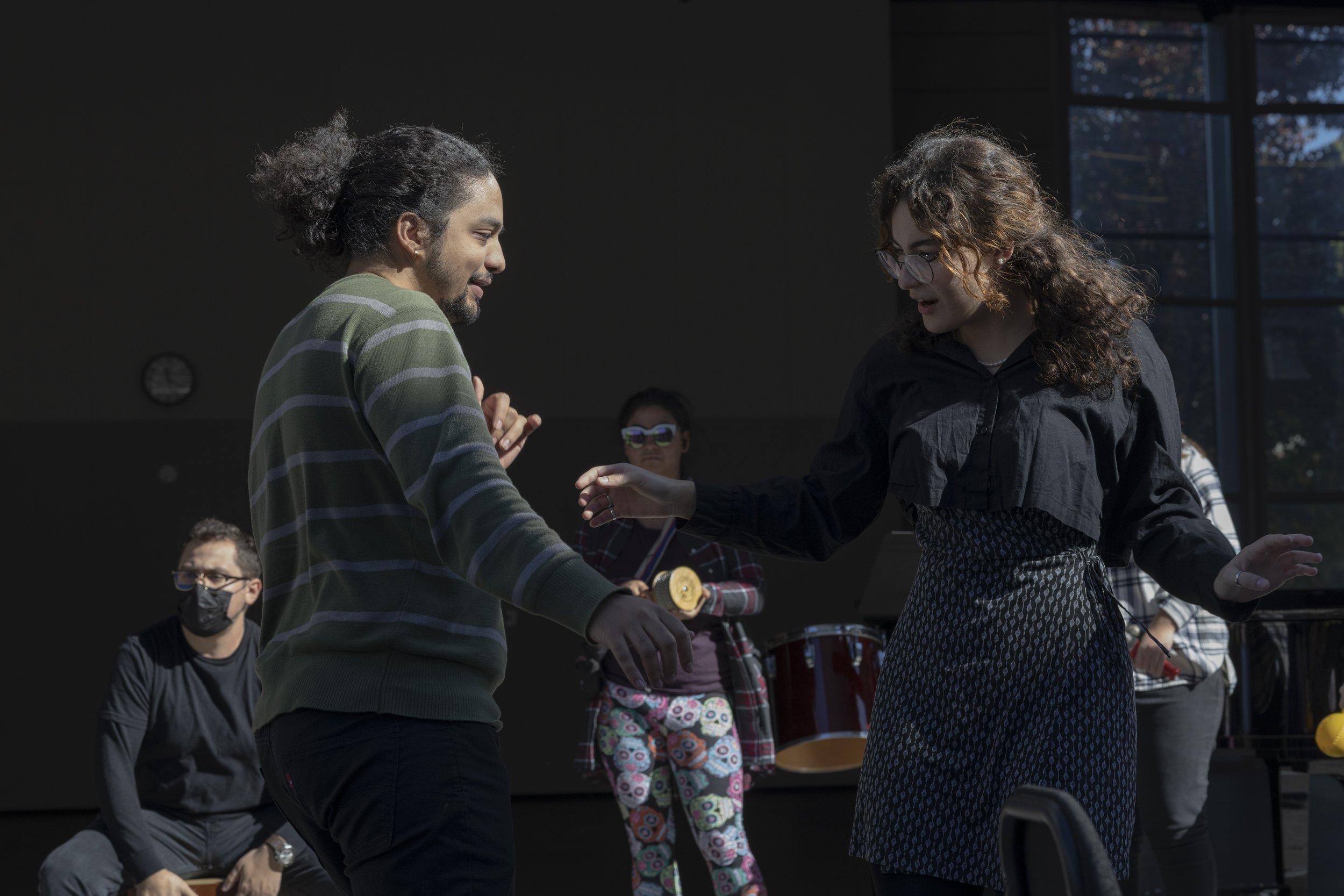  James Youssef (left) and Alya Olcan (right) dancing together while the Procussion Ensemble class performs for the crowd during SMC's Music Departments open house. November 15, 2022, Santa Monica, Calif. (Jamie Addison | The Corsair) 