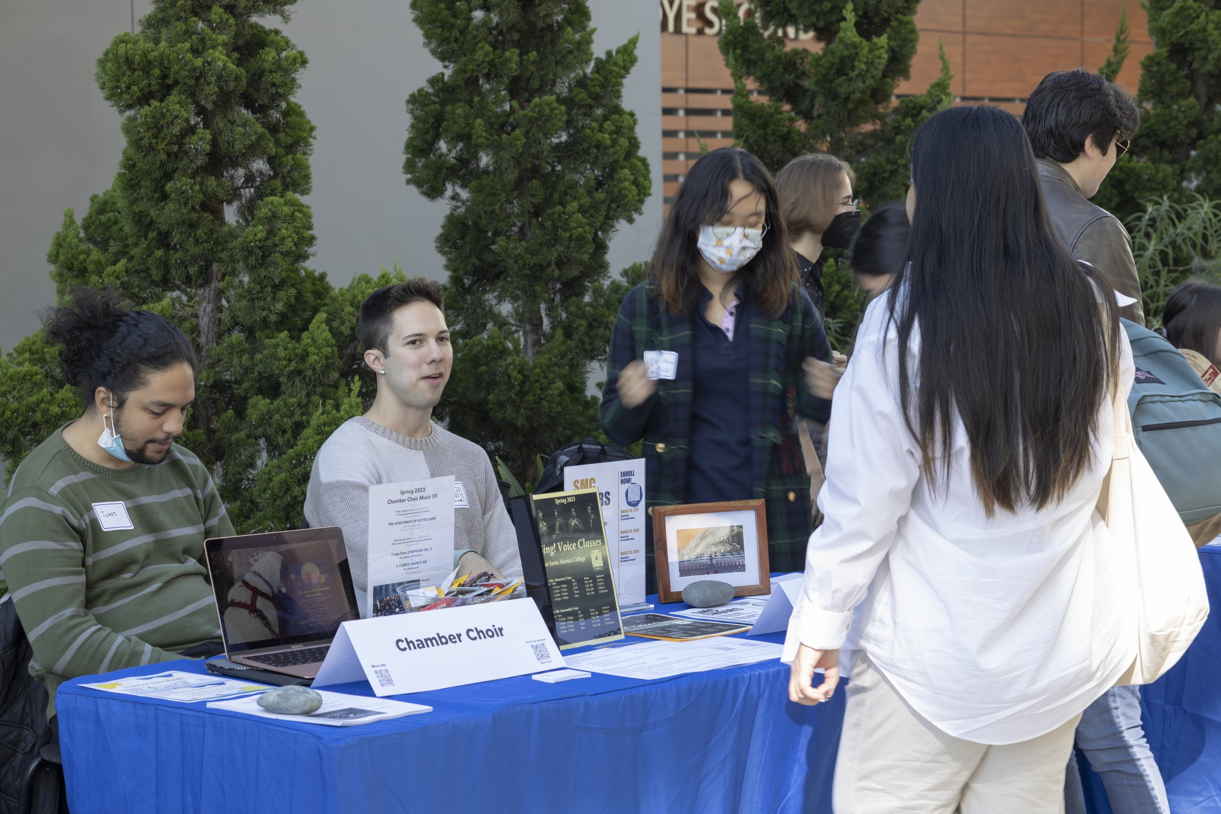  The Chamber Choir's table during the Santa Monica College Music Departments open house featured photos of past choir performances and QR codes to stay updated on the classes sign-up dates. November 15, 2022, Santa Monica, Calif. (Jamie Addison | The