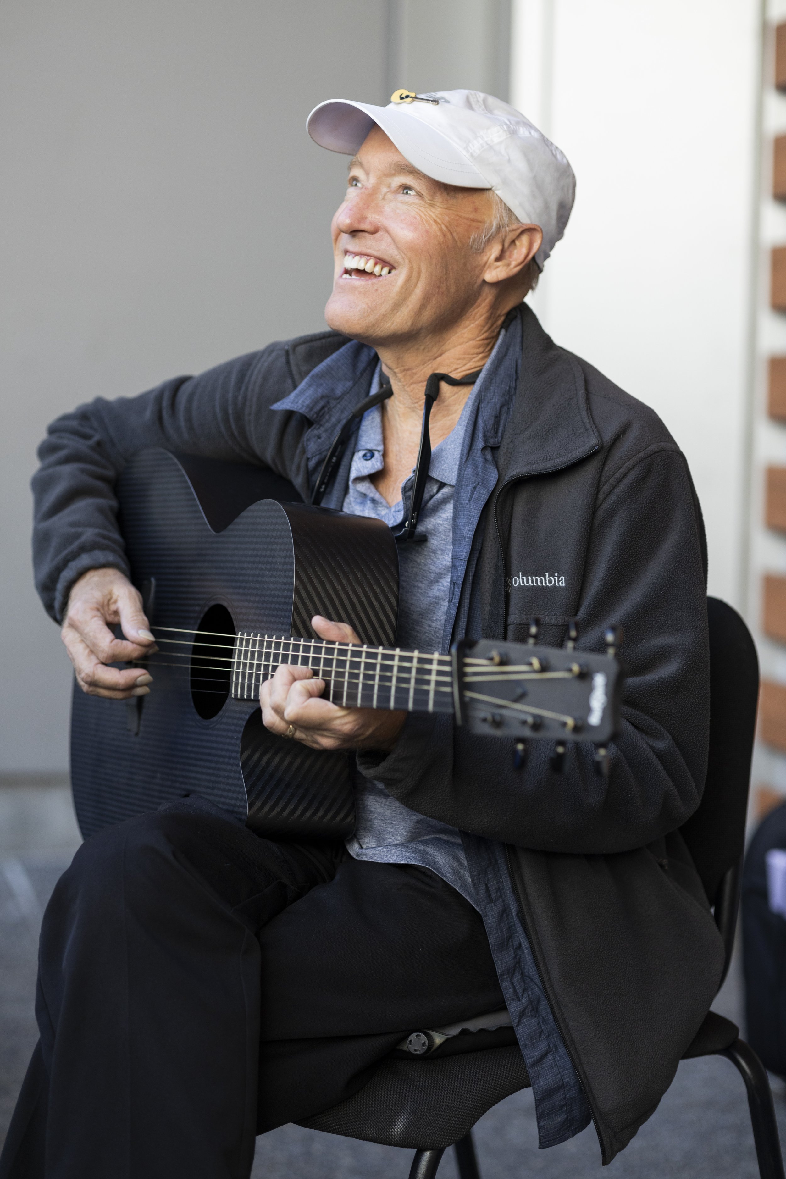  Jim Harmon, a guitar teacher for the Santa Monica College Music Department, playing his guitar during the open house and socializing with the students. November 15, 2022, Santa Monica, Calif. (Jamie Addison | The Corsair) 