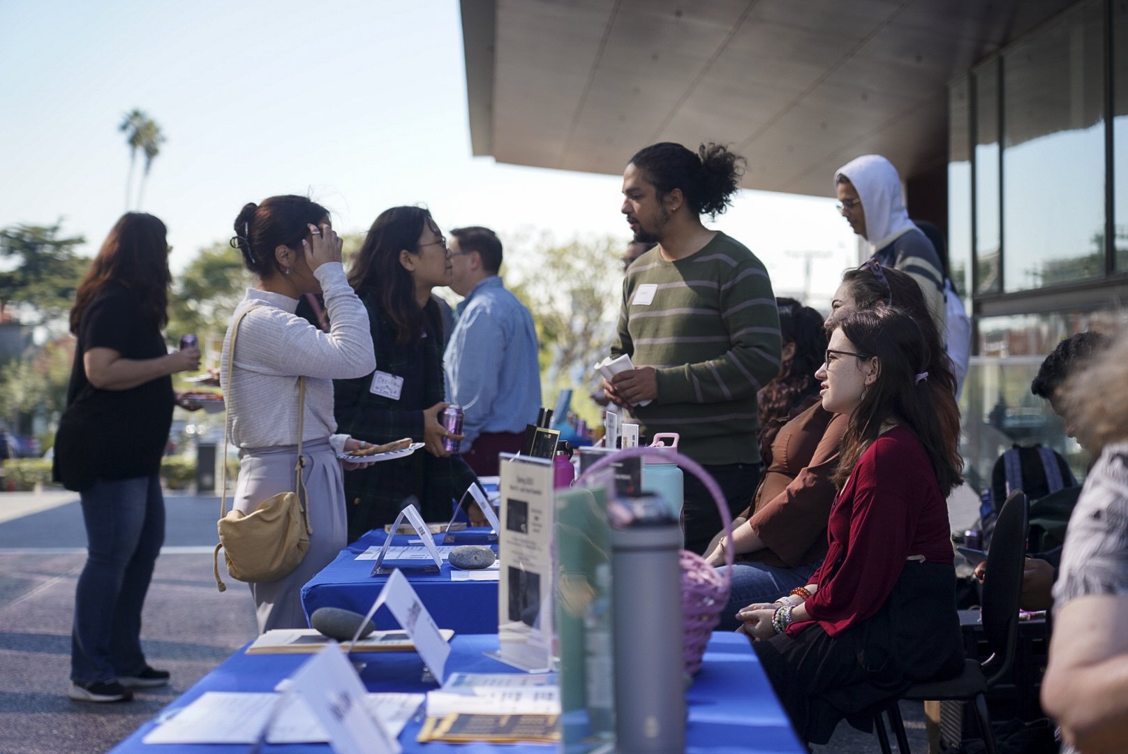  Students representing the Santa Monica College Music Department and attendees mingle and exchange information during an SMC open house Tuesday, Nov. 15 2022. 
