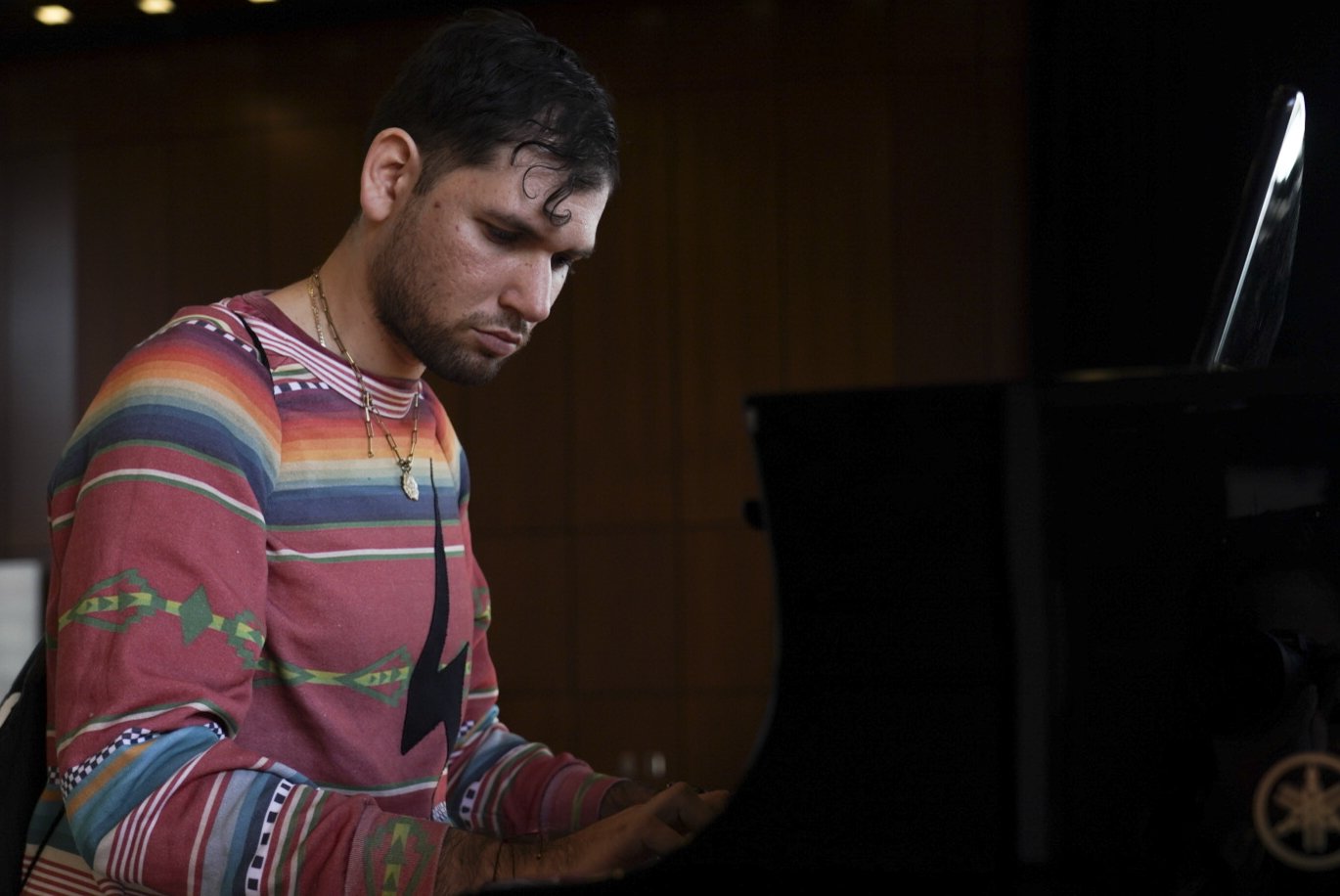  Apostol Kane, Santa Monica College Music Department Student, performs for attendees of an open house hosted by SMC faculty Tuesday, Nov. 15 2022. 