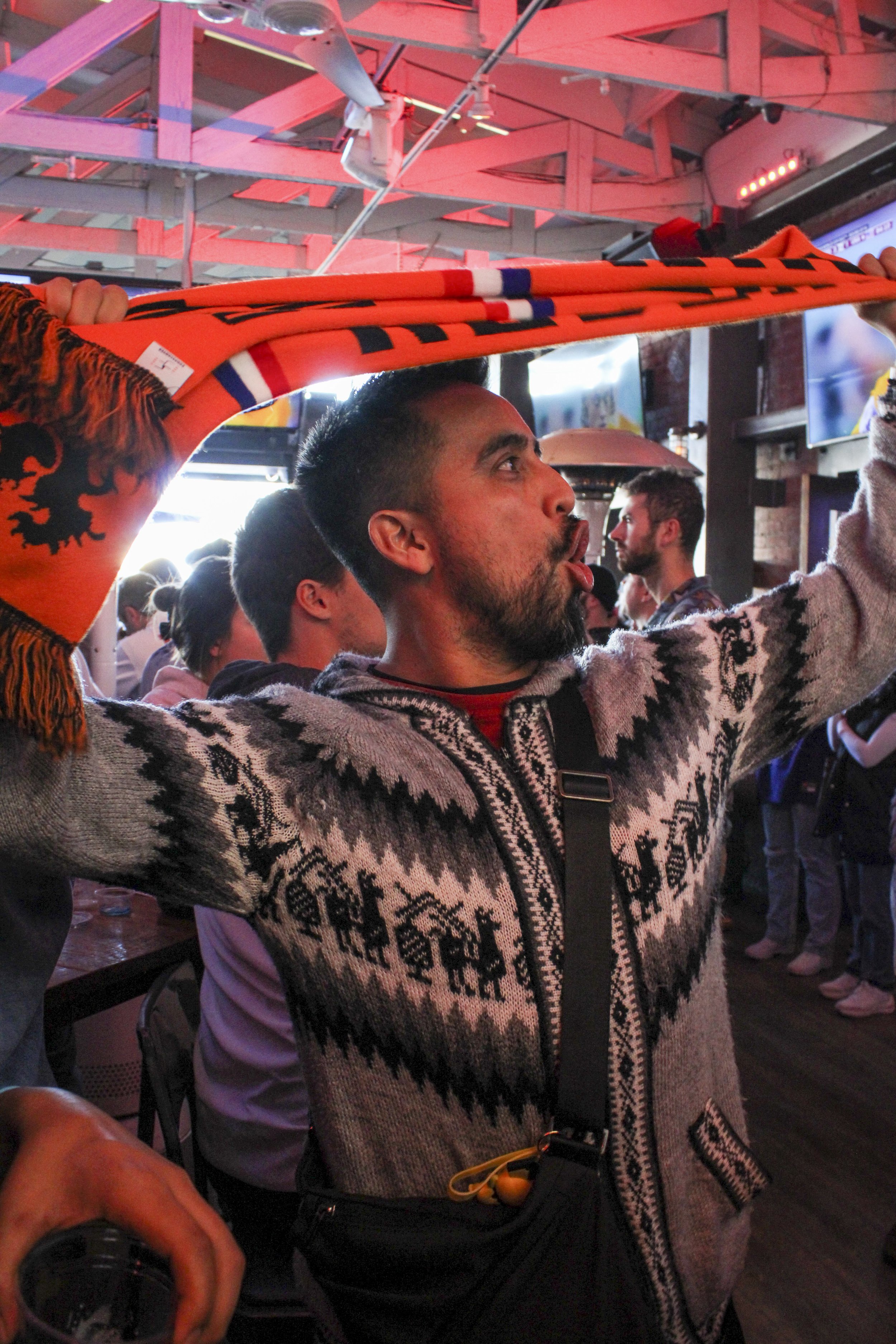  Netherlands fan Edgar “El Pochum” Nunez, Cheering for Netherlands Scoring a goal at there World Cup game of US Vs. Netherlands, being watched  the bar American Junky in Hermosa Beach, CA. (Reis Novakovic | The Corsair) 