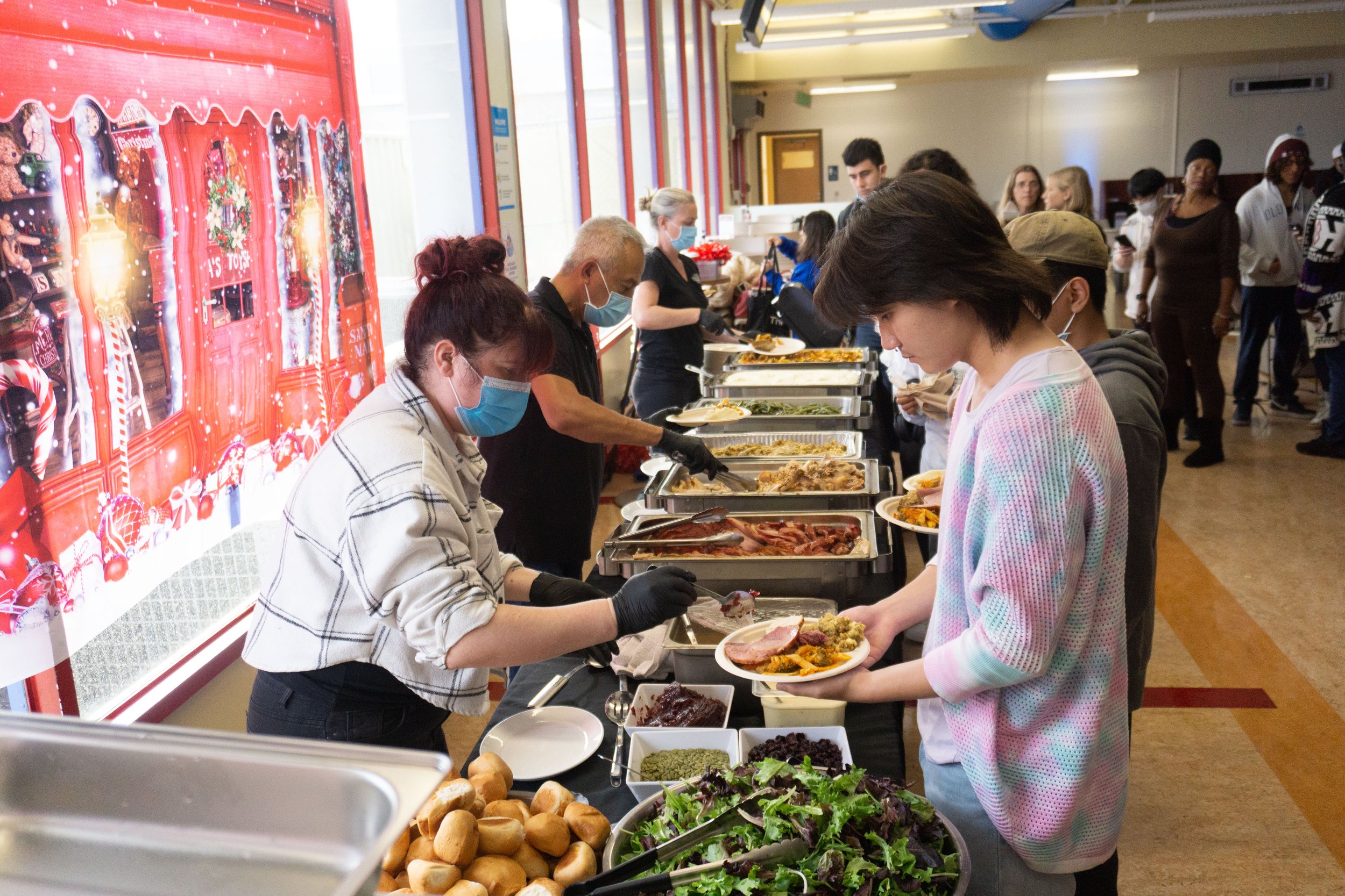  Nursing student Kevin Wei 20, at the Associated Students sponsored event geting a hot meal at the "Corsair Family Holiday Event" at Santa Monica College main campus in the Cayton Center and Cafeteria on Tuseday, December 6, 2022, in Santa Monica, Ca