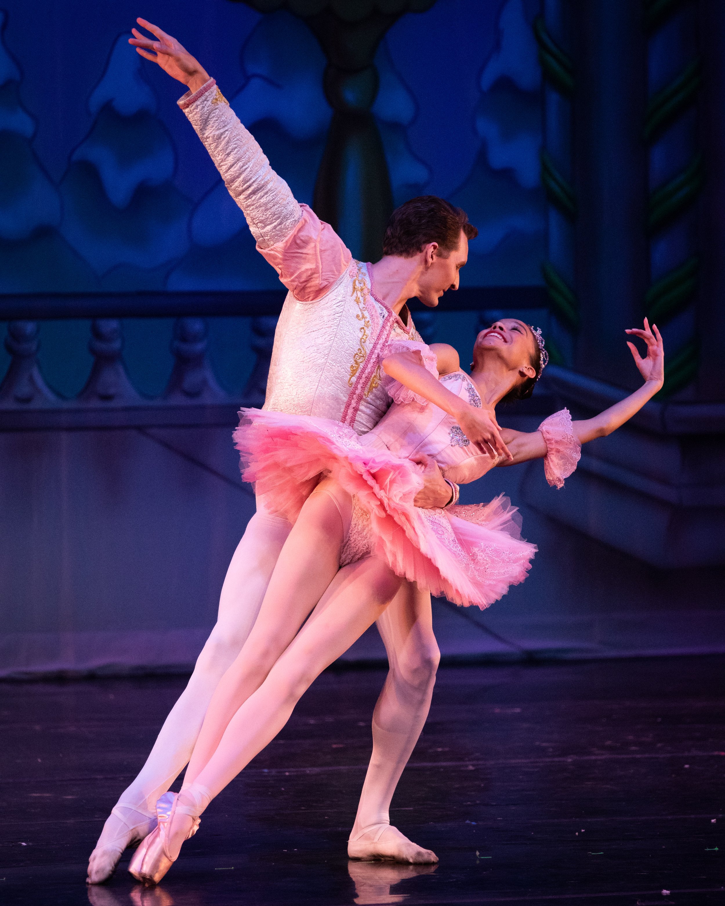  Jasime Harrison (right) and Maté Szentes (left) dancing together, as the characters Sugar Plum Fairy and her Cavalier,  during the Grand Pas de Deux right before the finale of The Nutcracker performed by Westside Ballet of Santa Monica at the The Br