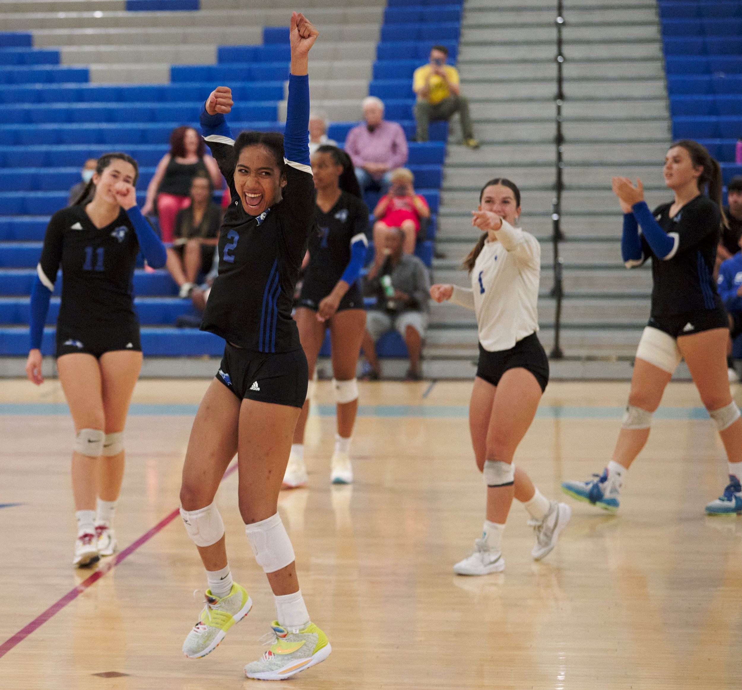  Members of the Santa Monica College Corsairs Women's Volleyball team, Maiella Riva, Amaya Bernardo, Zarha Stanton, Halle Anderson, and Mackenzie Wolff, celebrate after scoring during the match against the Bakersfield College Renegades on Wednesday, 