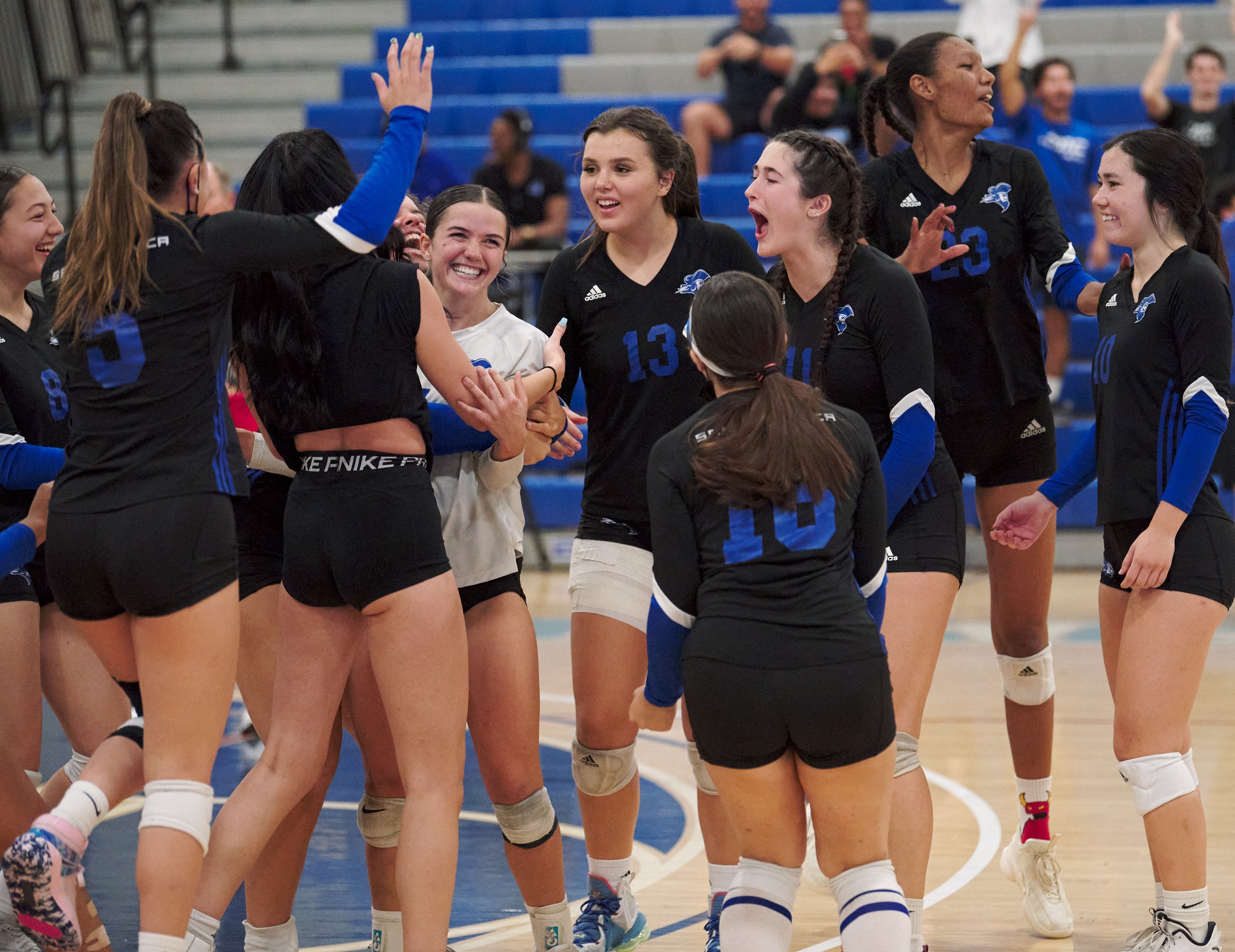  Members of the Santa Monica College Women's Volleyball team celebrate their 3-2 win against the Bakersfield College Renegades on Wednesday, Sept. 28, 2022, at the Corsair Gym in Santa Monica, Calif. (Nicholas McCall | The Corsair) 