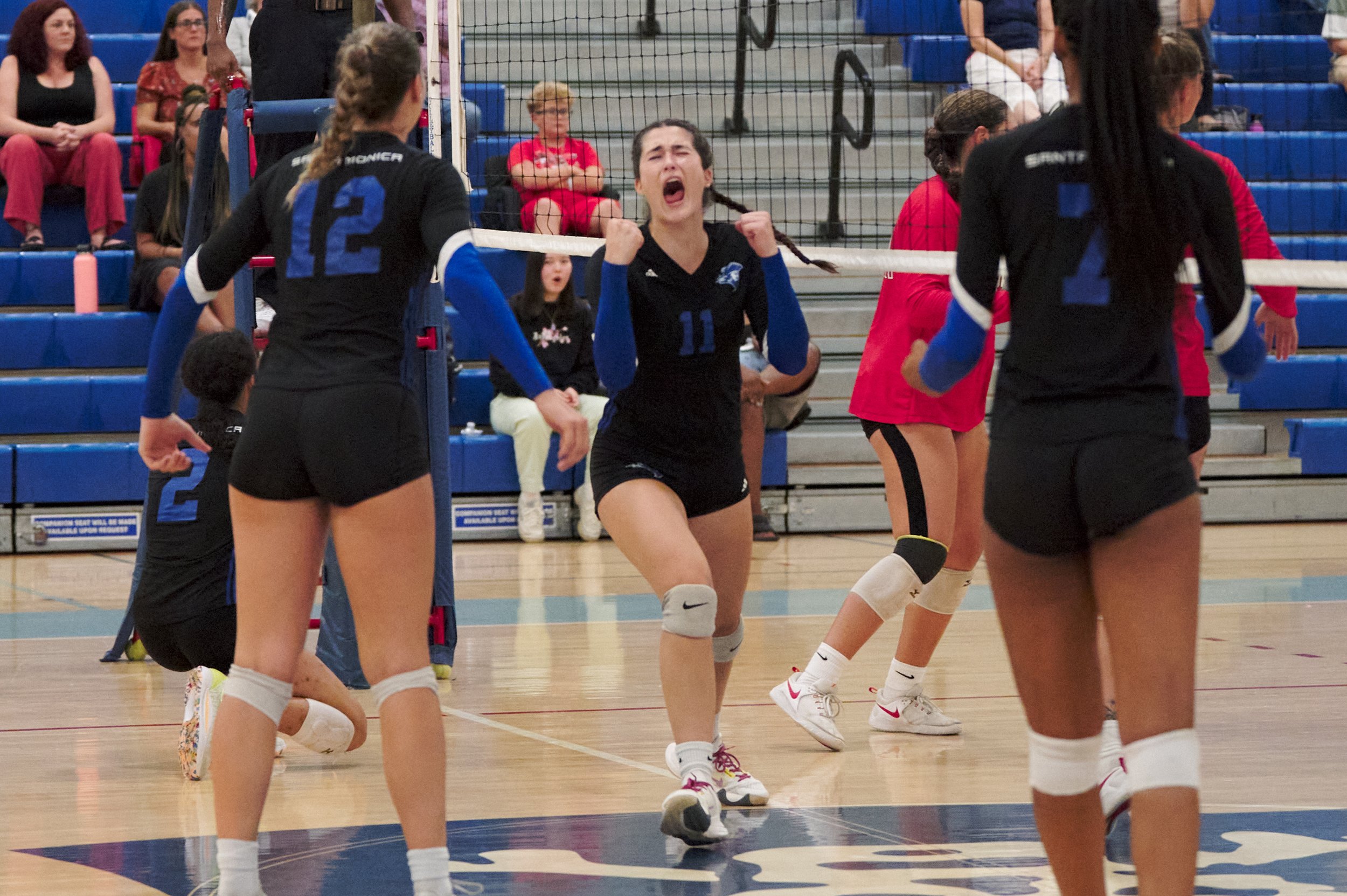  Maiella Riva (center) celebrates after scoring for the Santa Monica College Corsairs during the women's volleyball match against the Bakersfield College Renegades on Wednesday, Sept. 28, 2022, at the Corsair Gym in Santa Monica, Calif. The Corsairs 