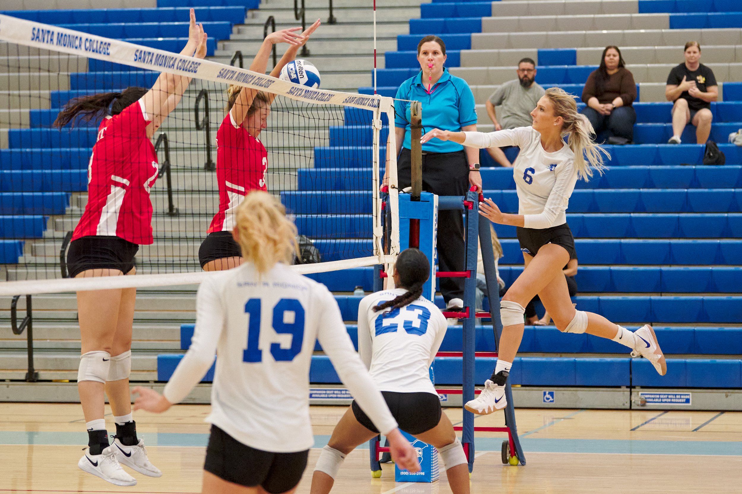 College of the Desert Roadrunners' Caitlin Bilhartz and Kaila Sandy fail to block Santa Monica College Corsairs' Sophia Lawrance's attack during the women's volleyball match against the College of the Desert Roadrunners on Friday, October 7, 2022, a