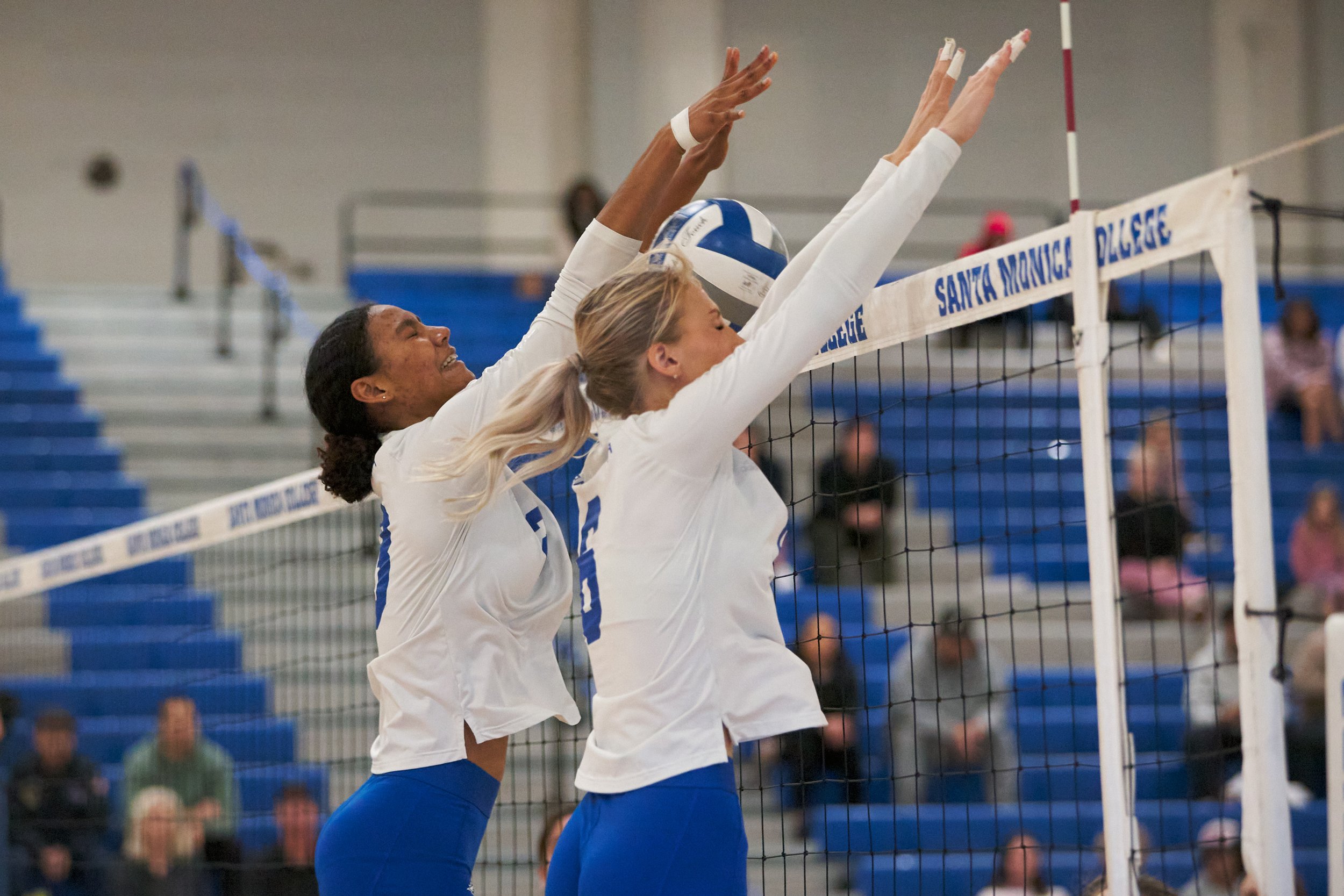  Santa Monica College Corsairs' Rain Martinez and Sophia Lawrance block the ball sent from the Glendale Community College Vaqueros during the women's volleyball match on Wednesday, Nov. 9, 2022, at SMC Gym in Santa Monica, Calif. The Corsairs won 3-0