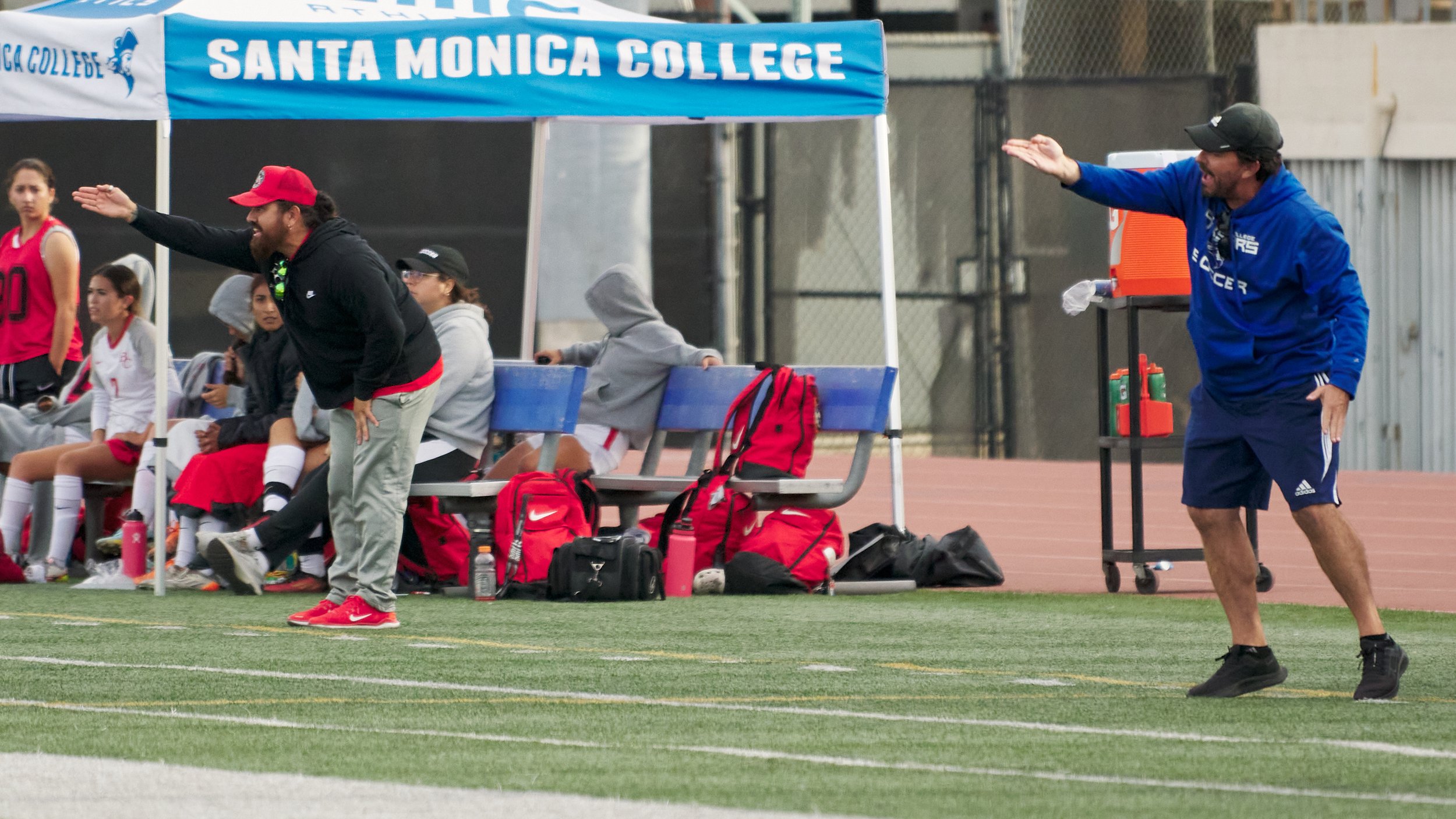  Bakersfield College Renegades Women's Soccer Head Coach Egar Linares and Santa Monica College Corsairs Women's Soccer Head Coach Aaron Benditson call out to players from the sideline during the women's soccer match on Friday, Oct. 20, 2022, at Corsa