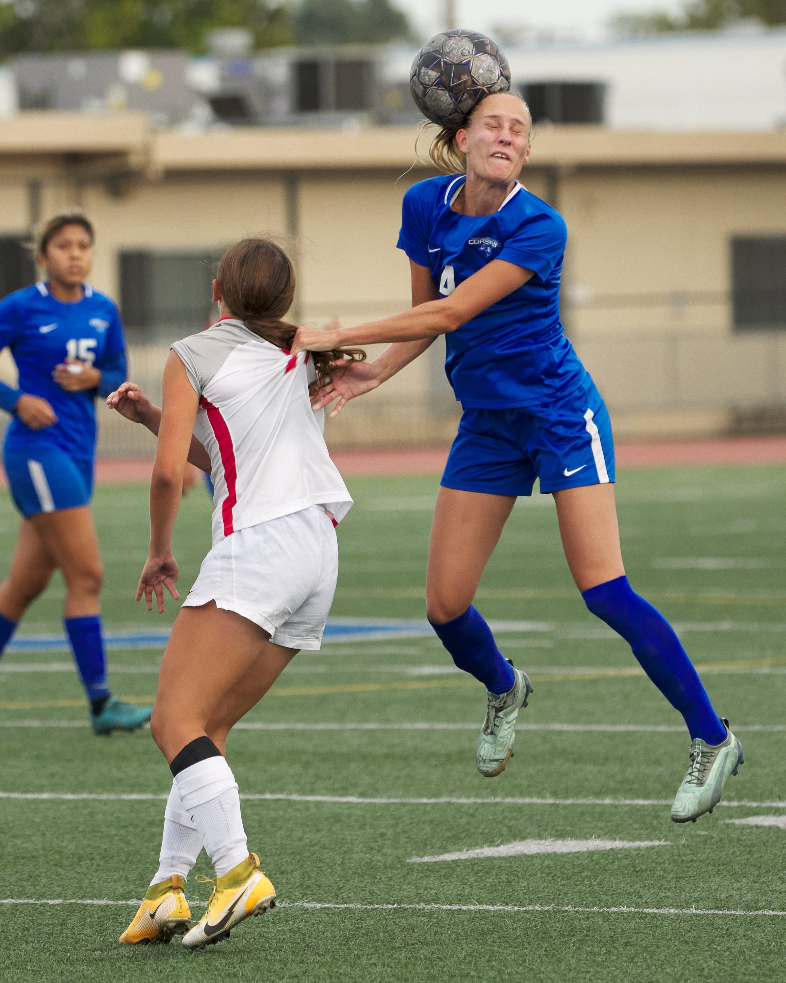 Santa Monica College Corsairs' Emma Rierstam (right) takes a ball to the head during the women's soccer match against the Bakersfield College Renegades on Friday, Oct. 20, 2022, at Corsair Field in Santa Monica, Calif. The Corsairs tied 1-1. (Nichol