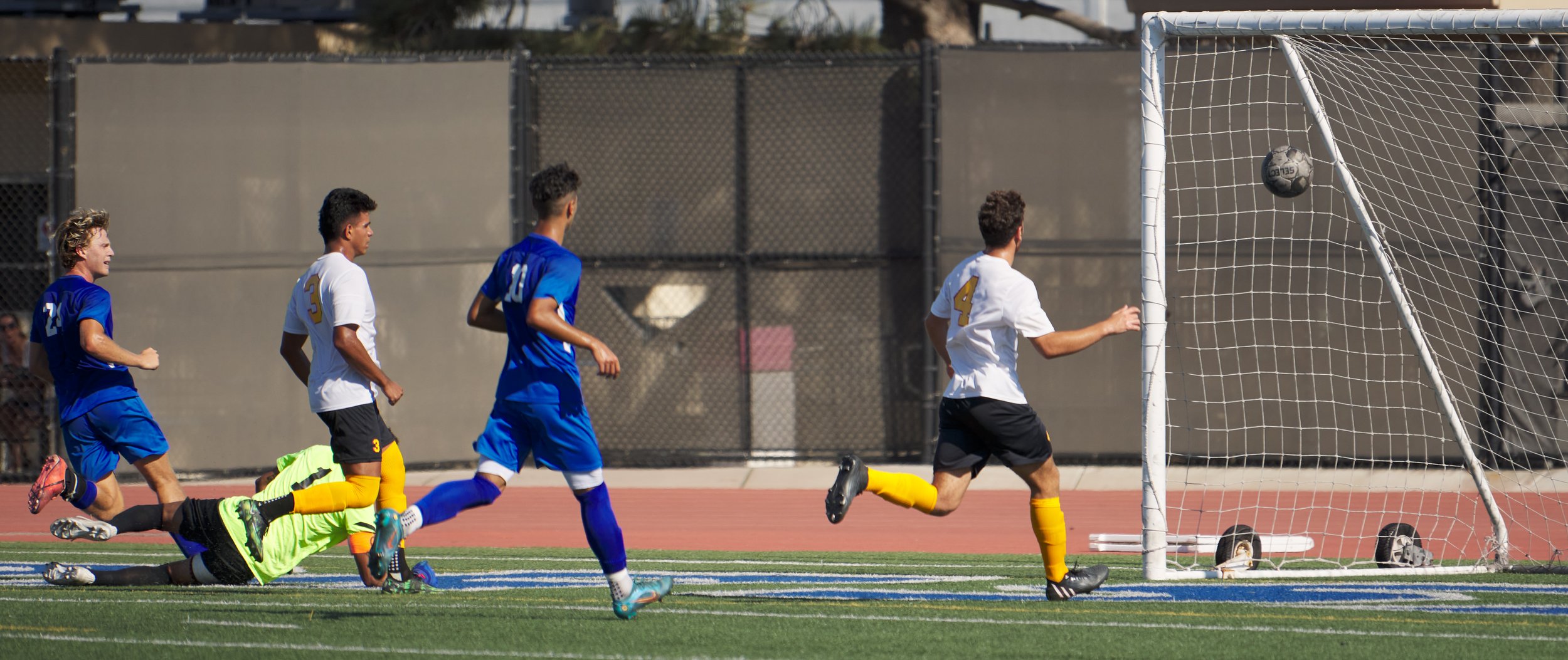  Alexander Lalor (left) scores the first goal of the men's soccer game for the Santa Monica College Corsairs against the Glendale Community College Vaqueros on Tuesday, Sept. 27, 2022, at Corsair Field in Santa Monica, Calif. The Corsairs won 3-0. (N