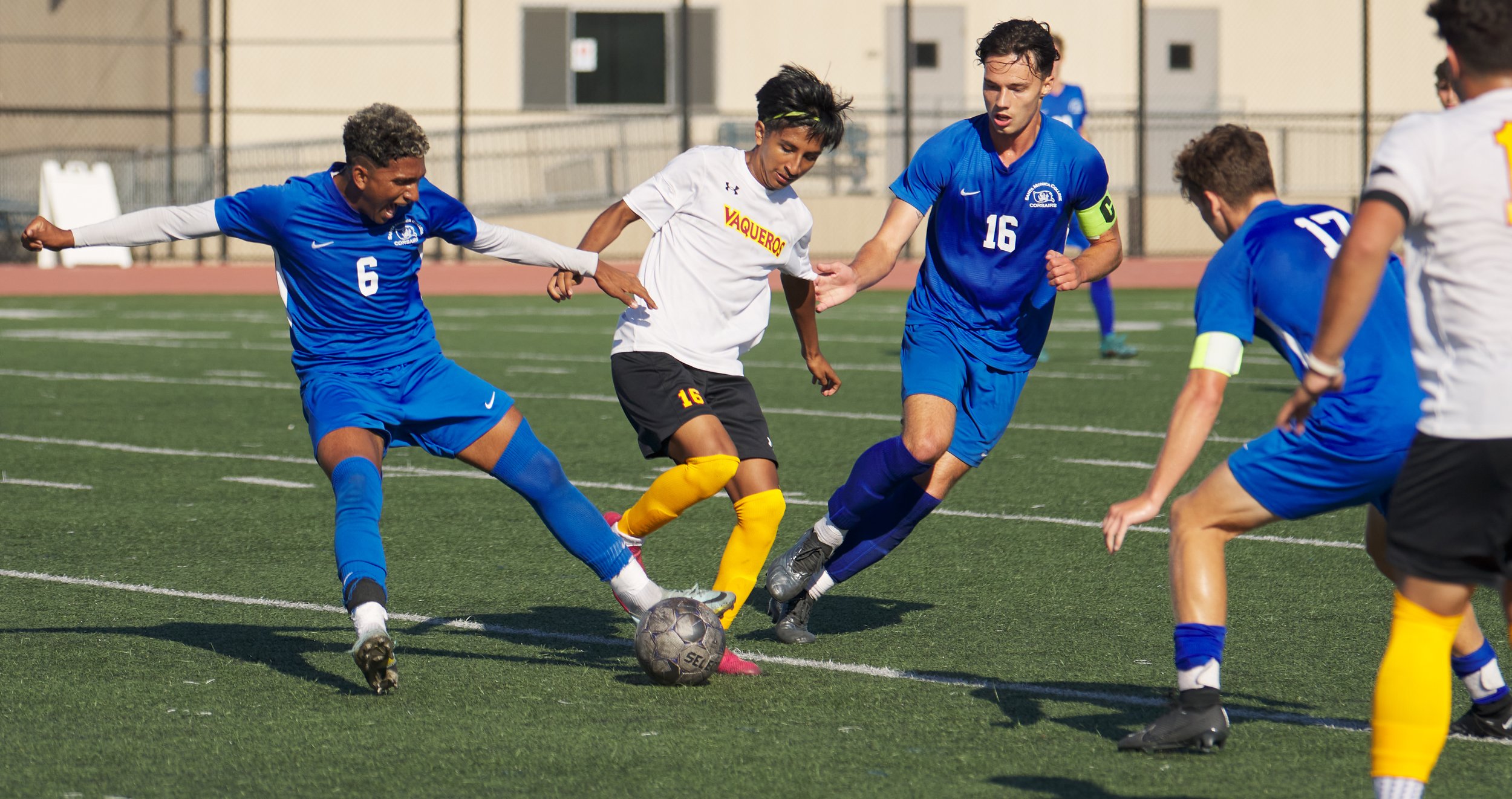  Sebastian Alvarez Luna and Kyler Sorber (right), of the Santa Monica College Corsairs, steal the ball from Jairo Hernandez, of the Glendale Community College Vaqueros during the men's soccer match on Tuesday, Sept. 27, 2022, at Corsair Field in Sant