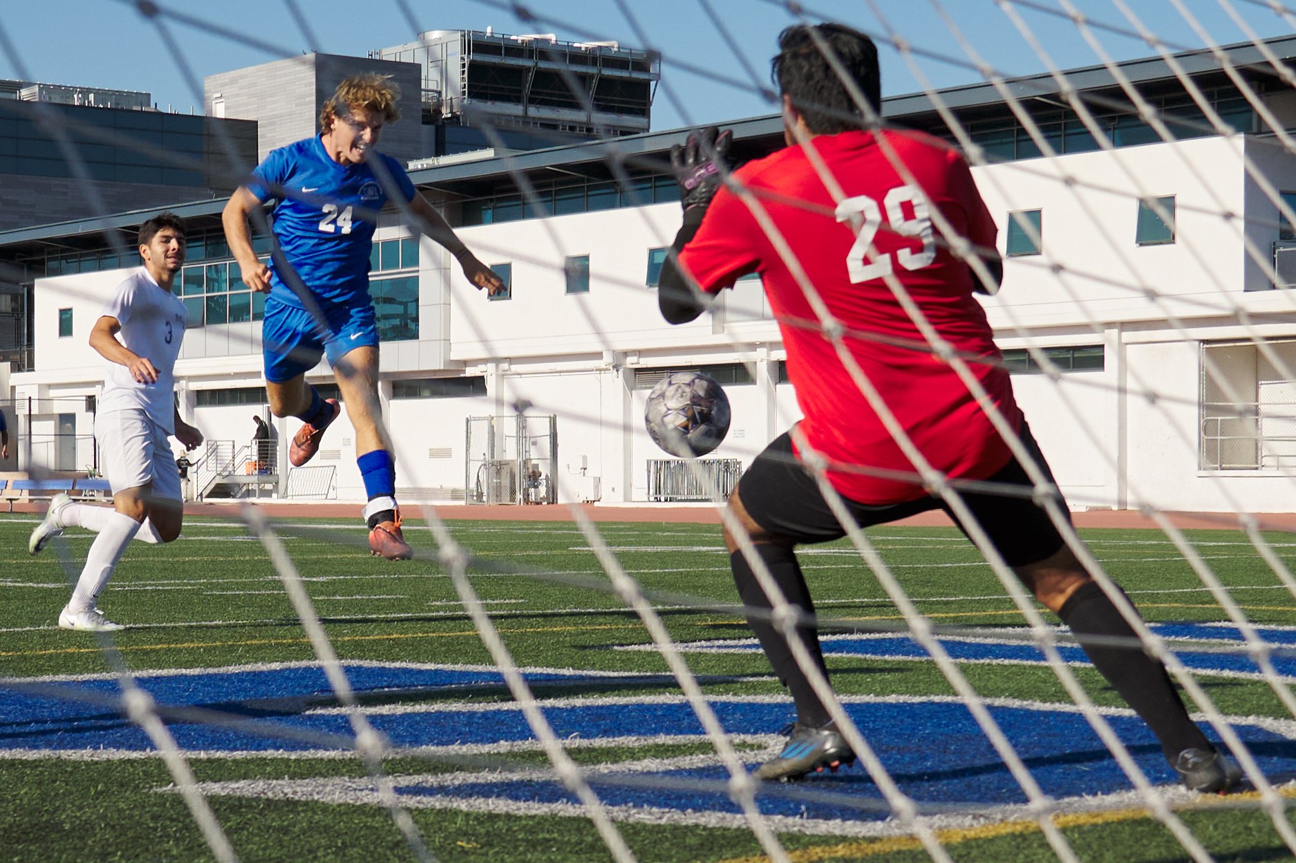  Santa Monica College Corsairs' Alexander Lalor takes a shot at the goal, only to be blocked by Moorpark College Raiders Goalie Jonathan Rivera, during the men's soccer match on Tuesday, Oct. 25, 2022, at Corsair Field in Santa Monica, Calif. The Cor